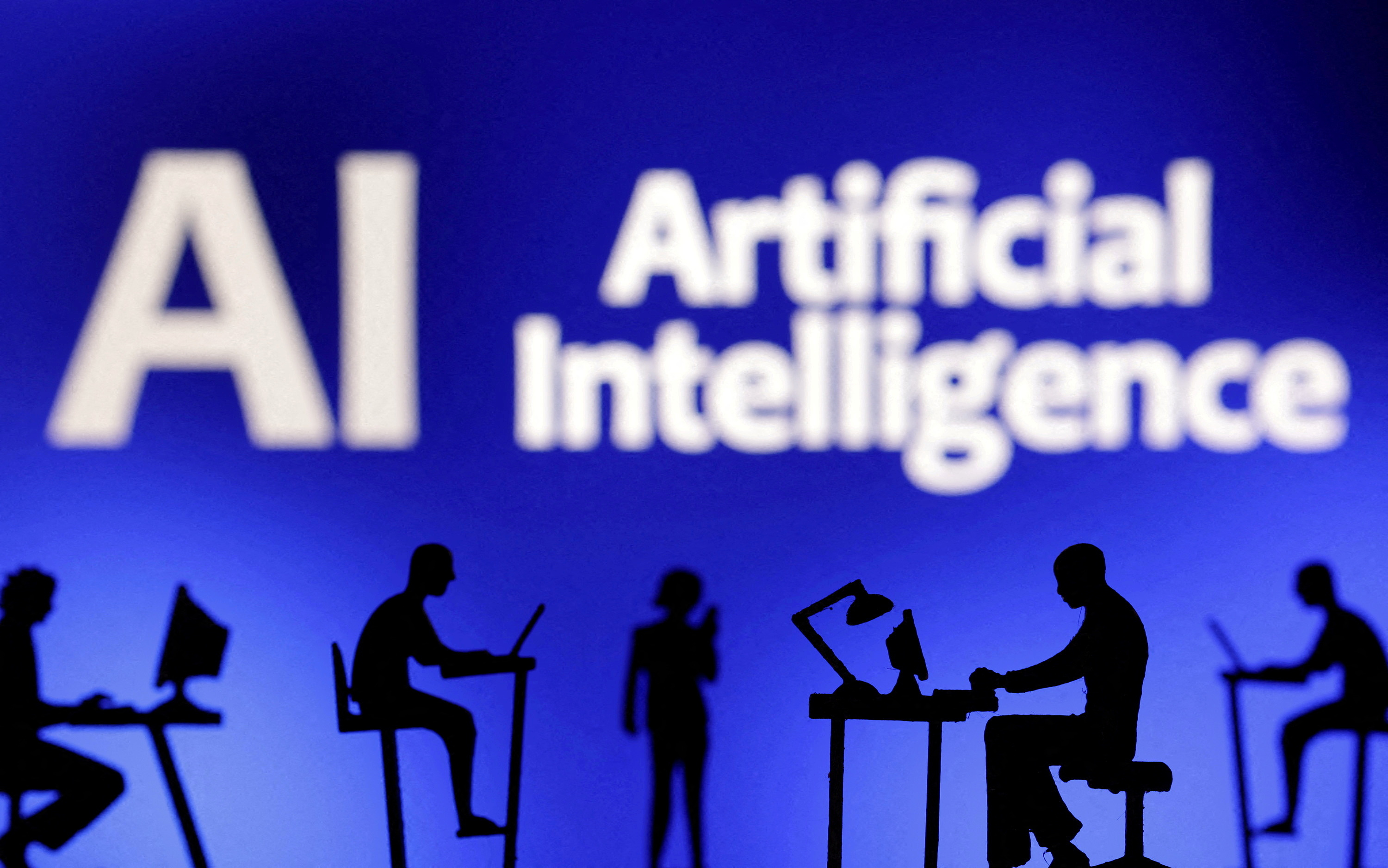 FILE PHOTO: Illustration shows words "Artificial Intelligence AI