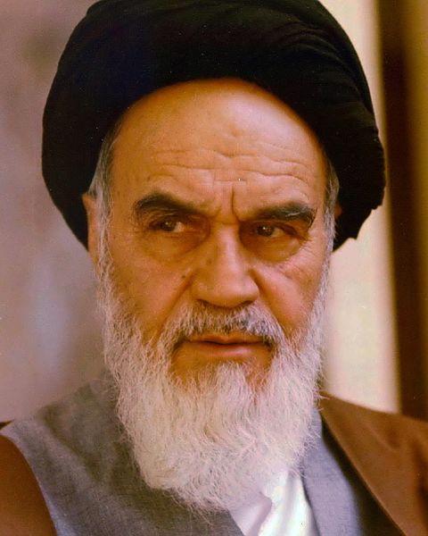 1729613129-Portrait_of_Ruhollah_Khomeini_By_Mohammad_Sayyad_cropped.jpg