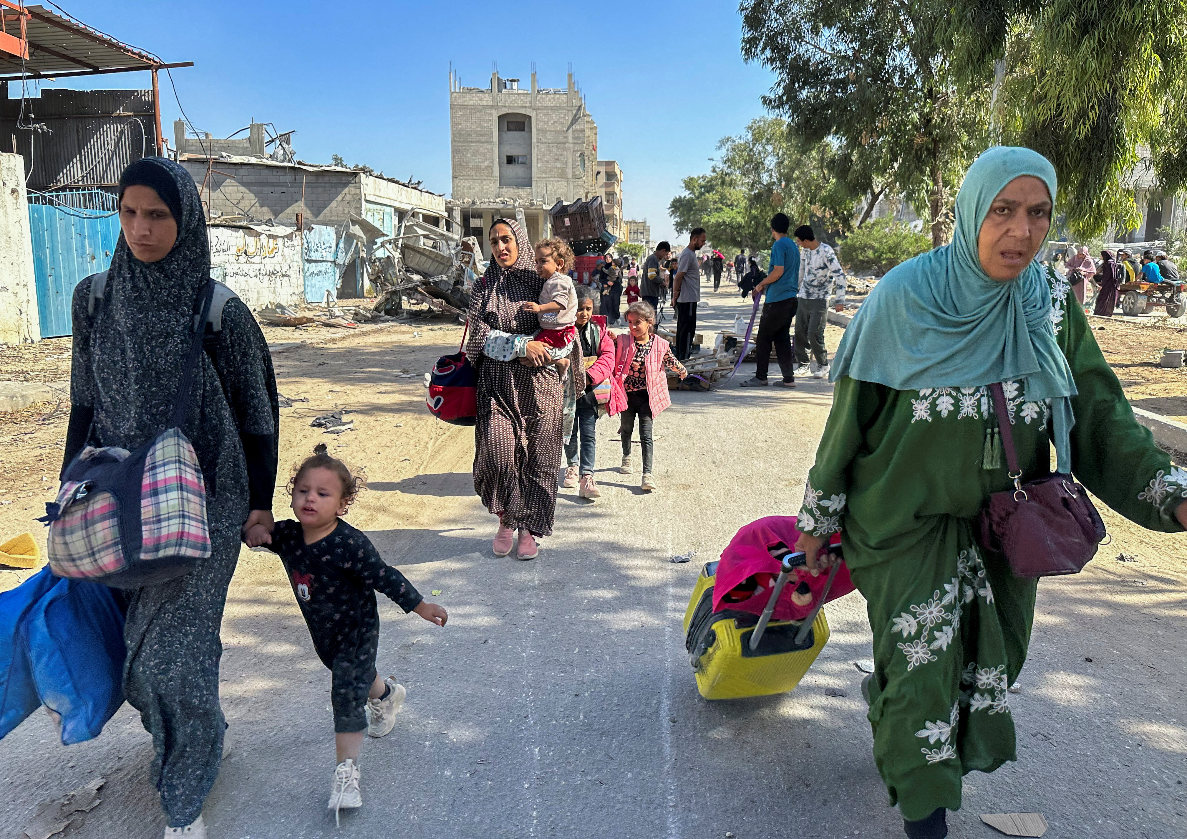 Displaced Palestinians flee the northern part of Gaza amid an Israeli military operation, in Jabalia in the northern Gaza Strip