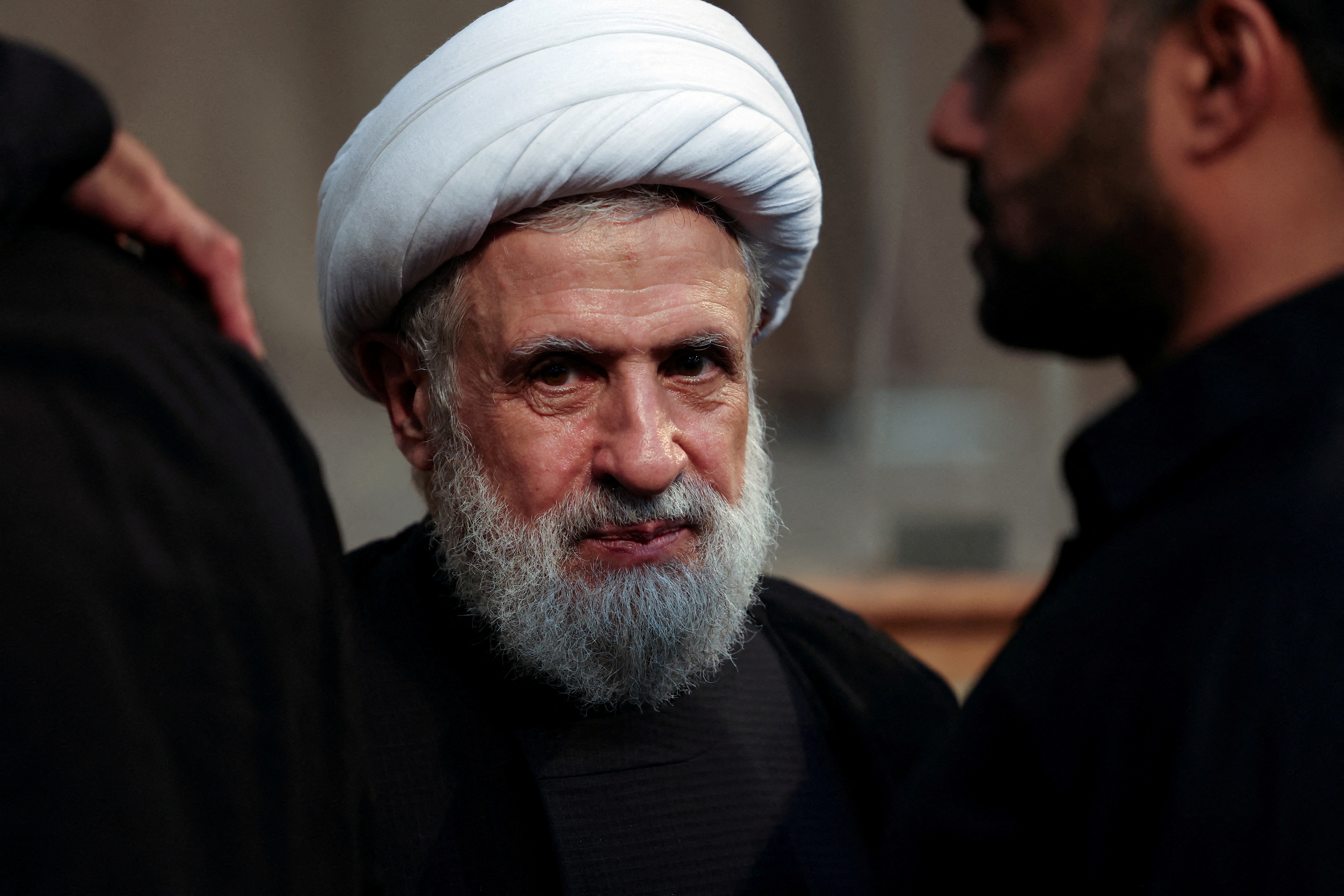FILE PHOTO: Lebanon's Hezbollah deputy leader Sheikh Naim Qassem accepts condolences for the death of Hezbollah senior commander Fuad Shukr, in Beirut's southern suburbs