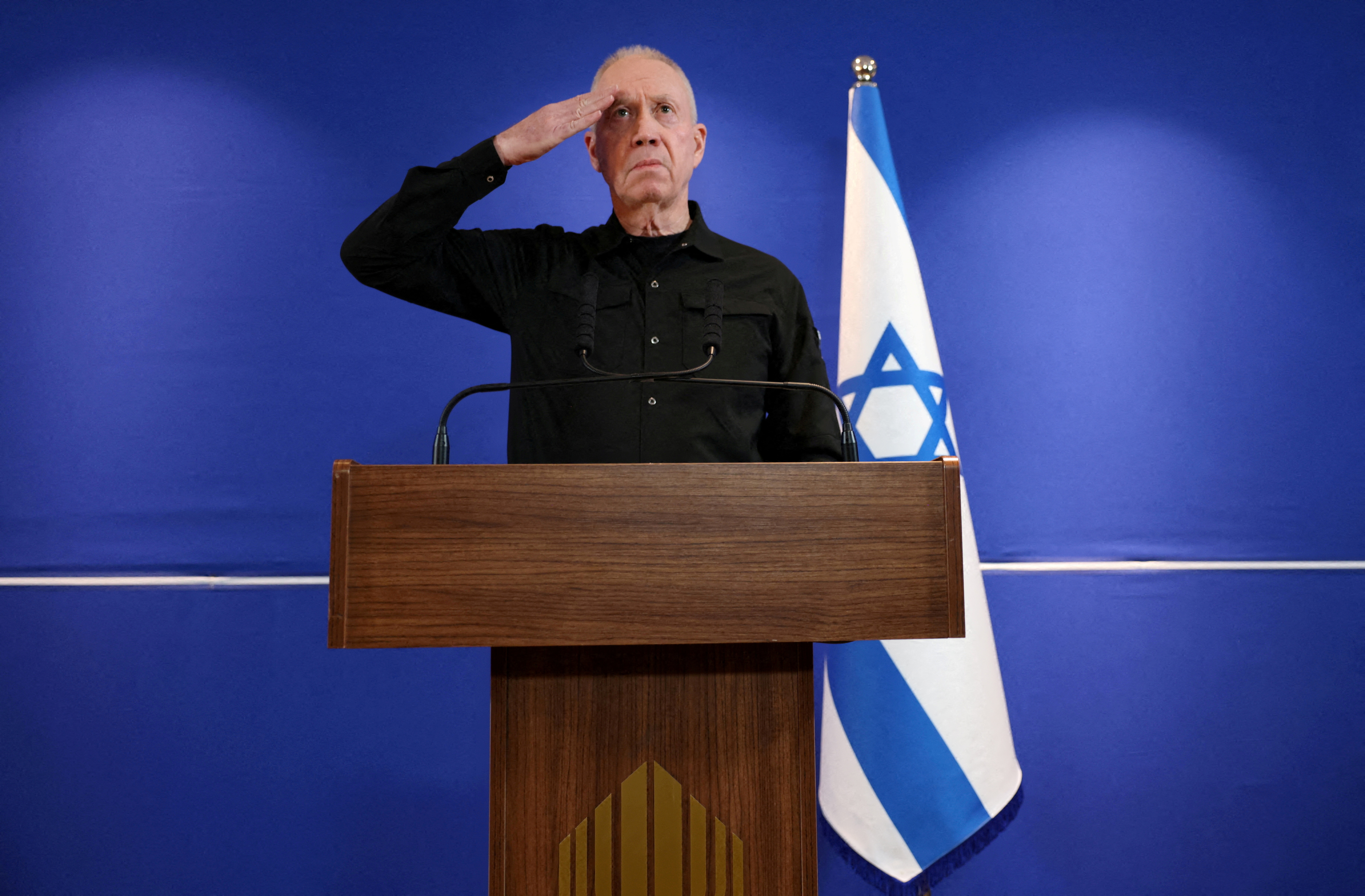 Former Israeli Defense Minister Yoav Gallant speaks to members of the press, in Tel Aviv