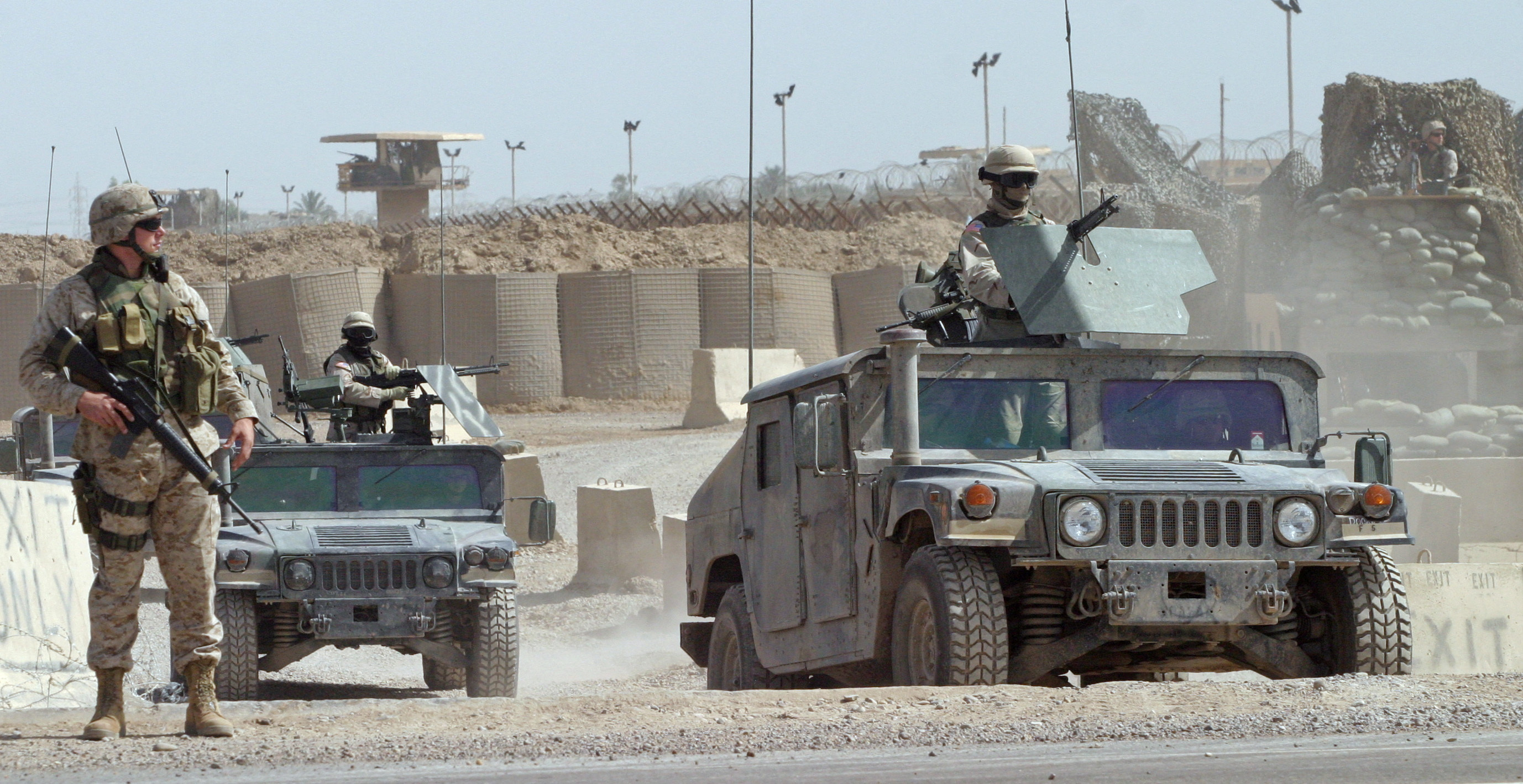 FILE PHOTO: U.S. FORCES GUARD OUTSIDE THE PRISON OF ABU GHRAIB WEST OF BAGHDAD.