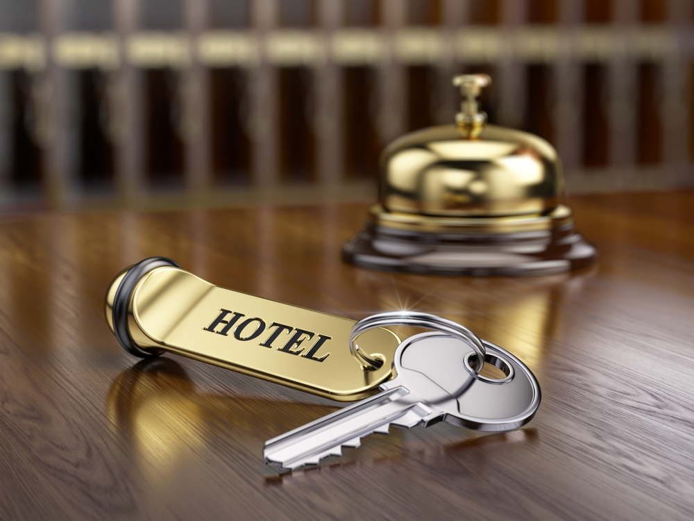 Hotel,Key,And,Reception,Bell,On,Reception,Desk