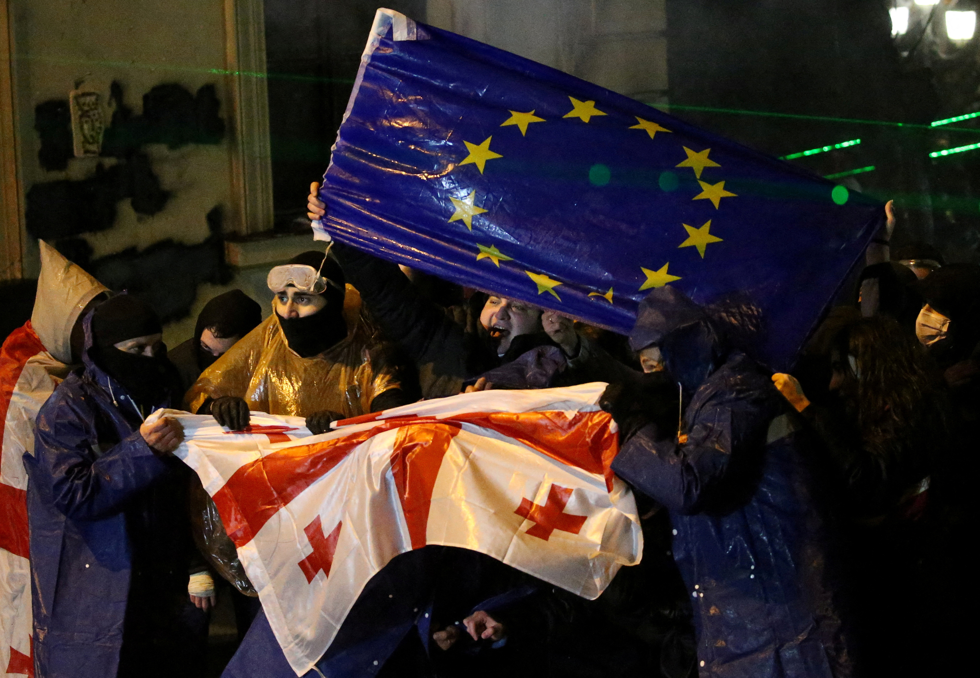 Georgian opposition supporters protest against government's EU application delay, in Tbilisi