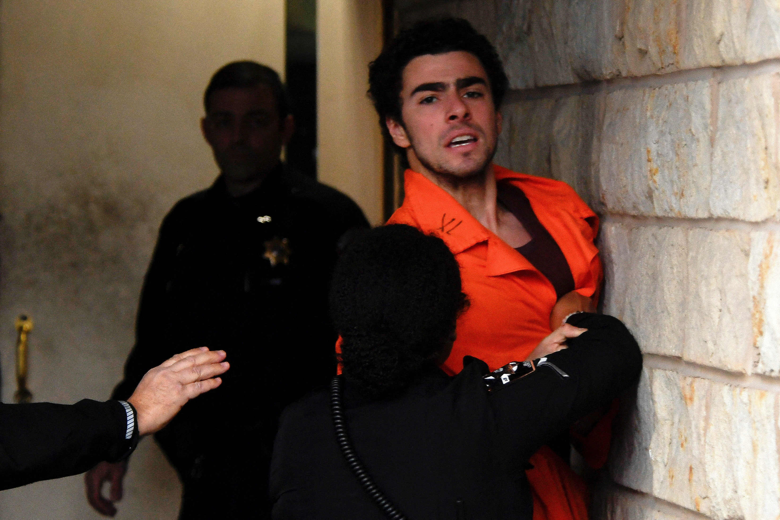 Luigi Mangione arrives for an extradition hearing at Blair County Court House in Hollidaysburg, Pennsylvania