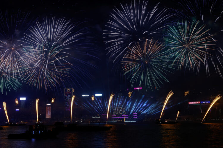 Fireworks explode over Victoria Harbour to celebrate the New Year in Hong Kong