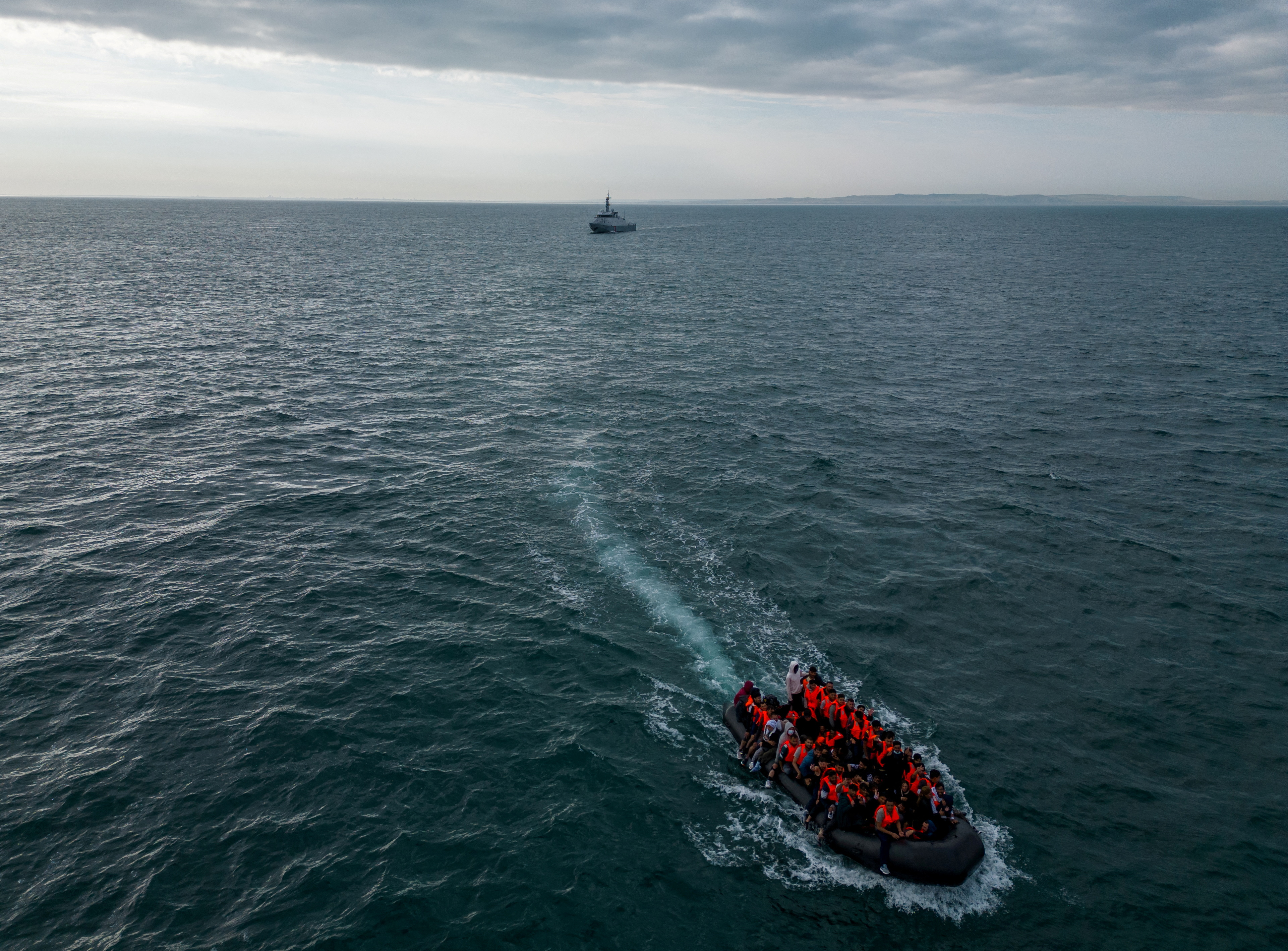 FILE PHOTO: Migrants cross the English Channel in small boats