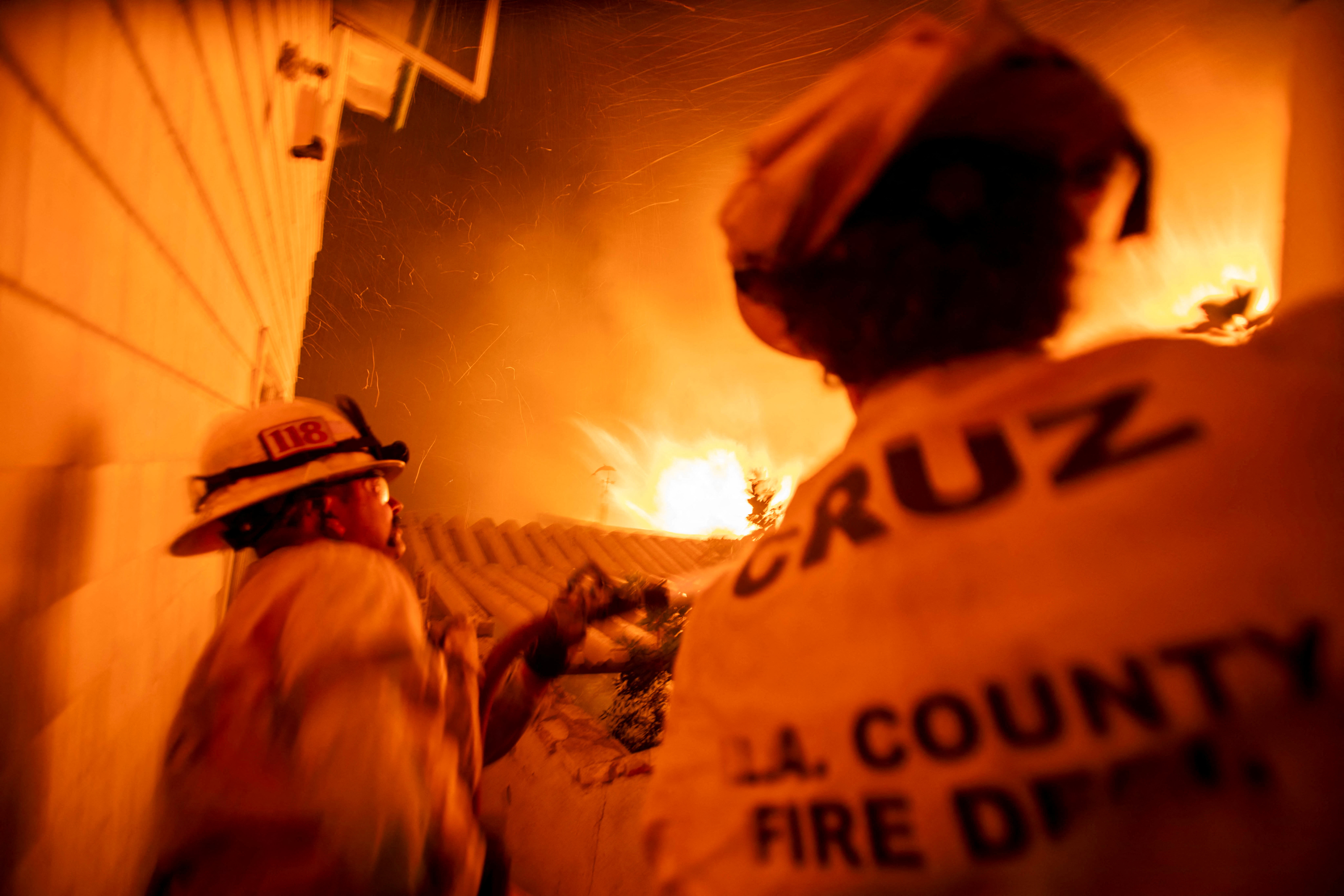 Palisades fire burns during a windstorm on the west side of Los Angeles