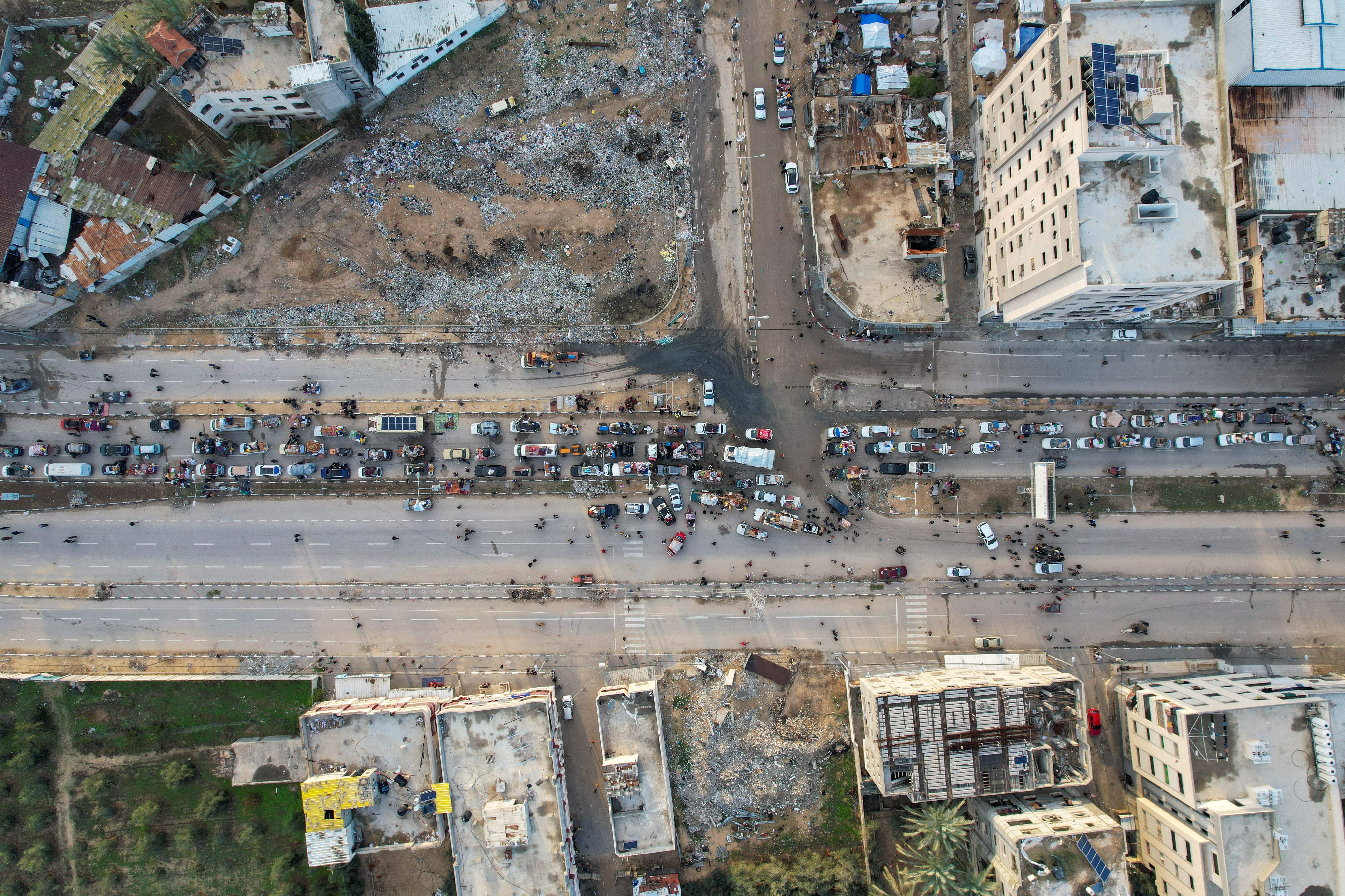 A drone view shows displaced Palestinians waiting to be allowed to return to their homes in northern Gaza, in the central Gaza Strip