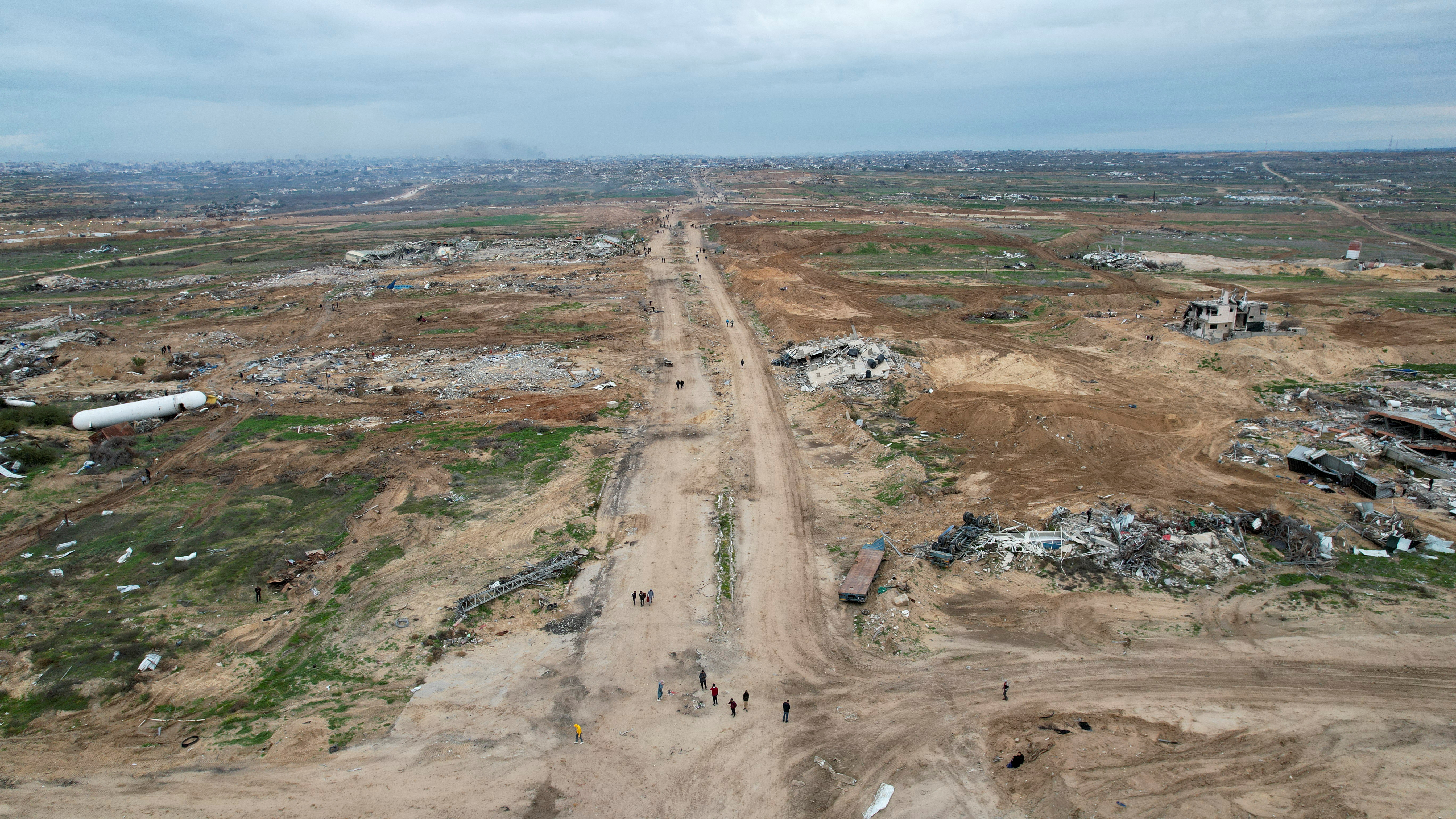 A drone view shows buildings lying in ruins after Israeli forces withdrew from the Netzarim Corridor, amid a ceasefire between Israel and Hamas, near Gaza City