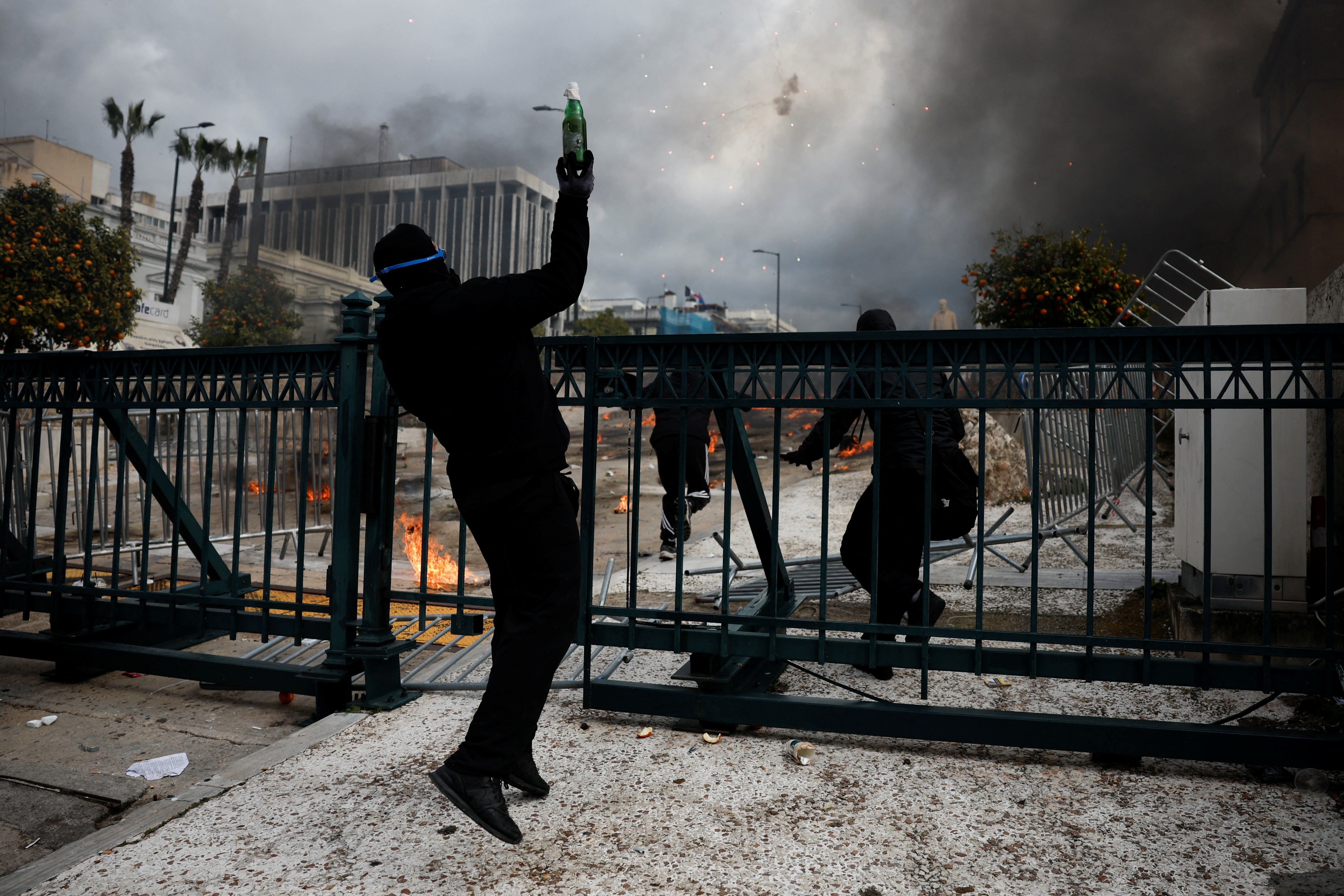 People gather in front of the Greek parliament during a protest, in Athens