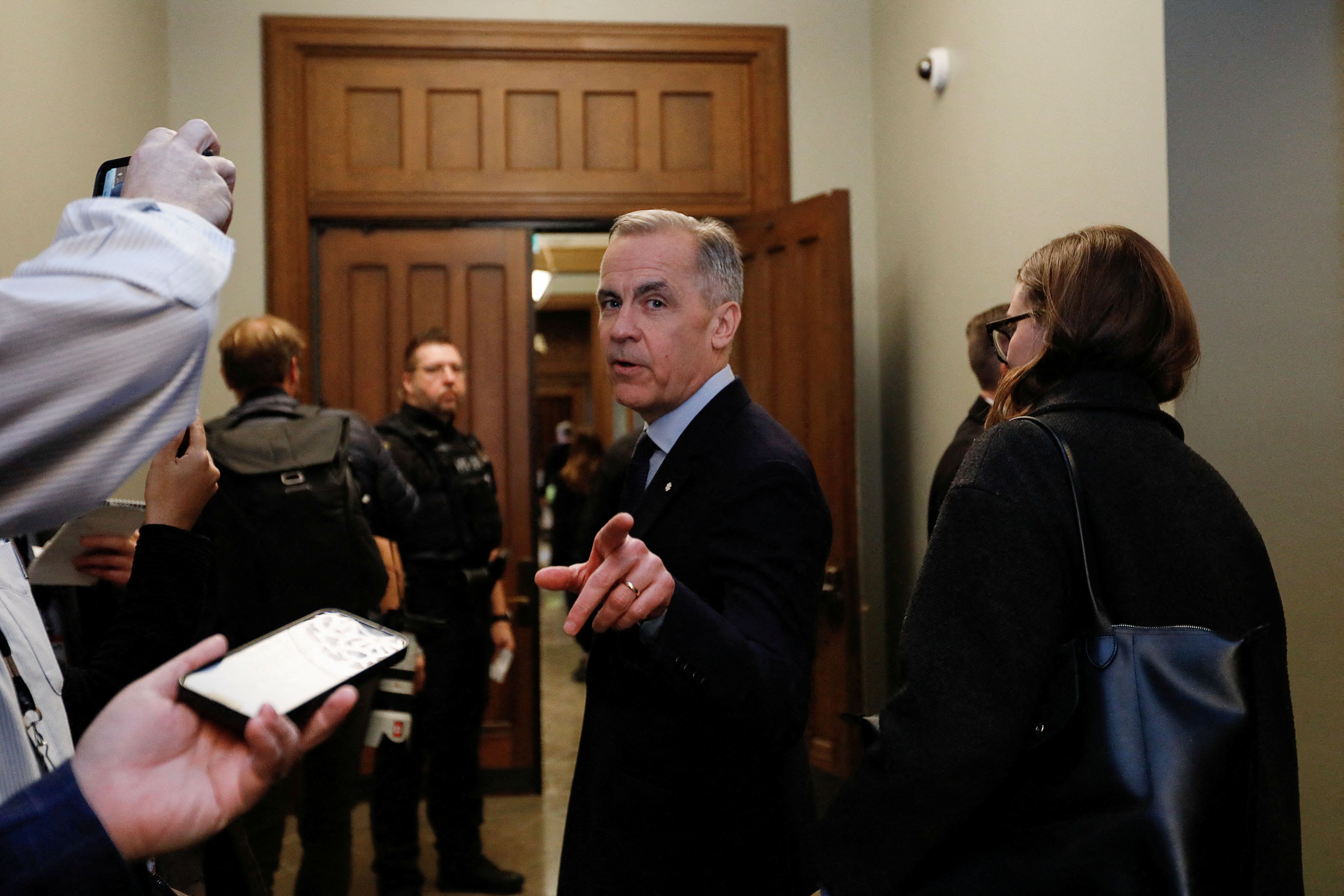 Canada's Prime Minister-designate Mark Carney leaves the Prime Minister's office, after being elected Liberal Leader the previous day