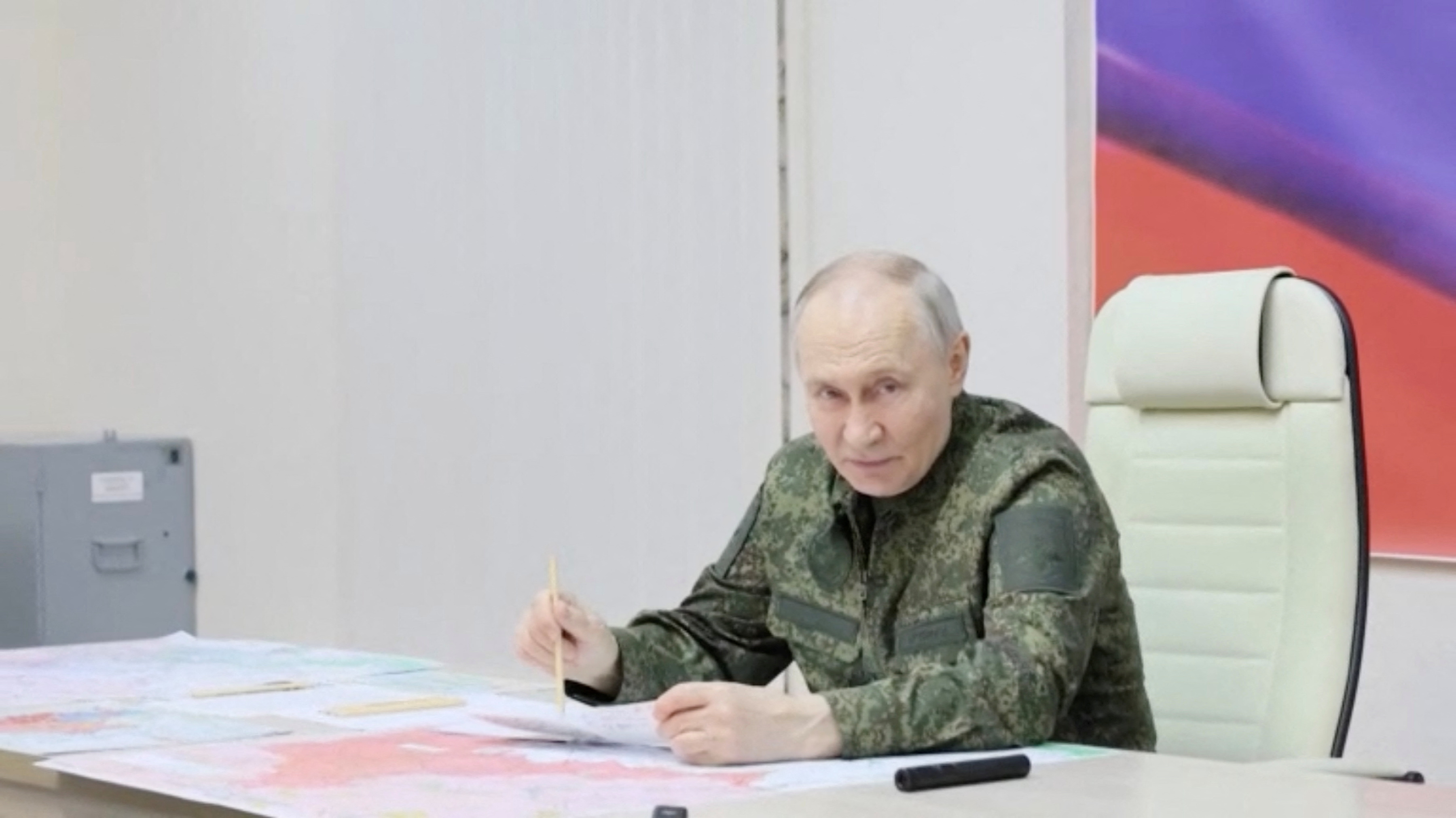 Russia's President Putin visits armed forces' command centre in Kursk region