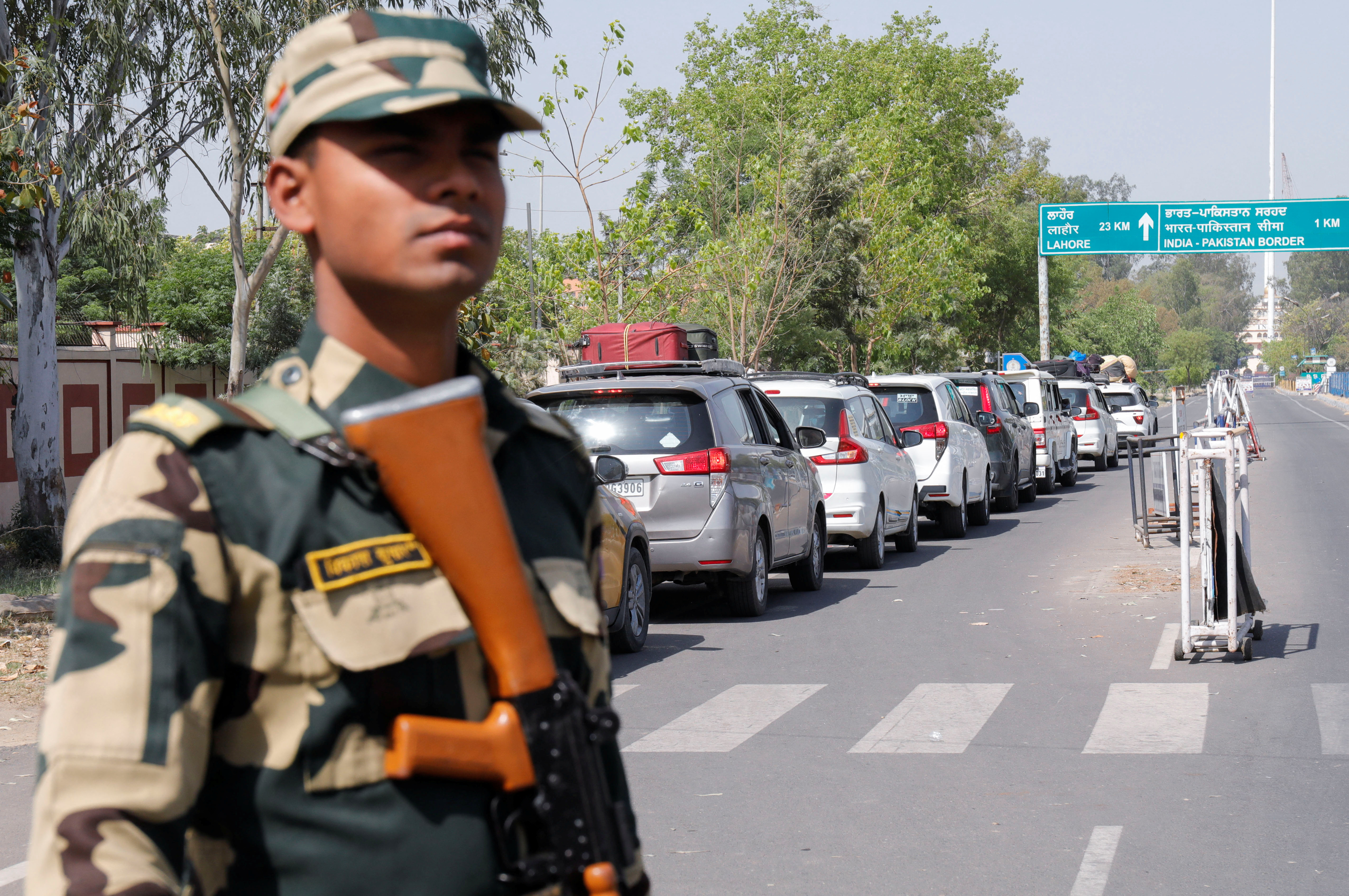 A Border Security Force (BSF) security personnel stands guard at the Attari-Wagah crossing on the India-Pakistan border near Amritsar