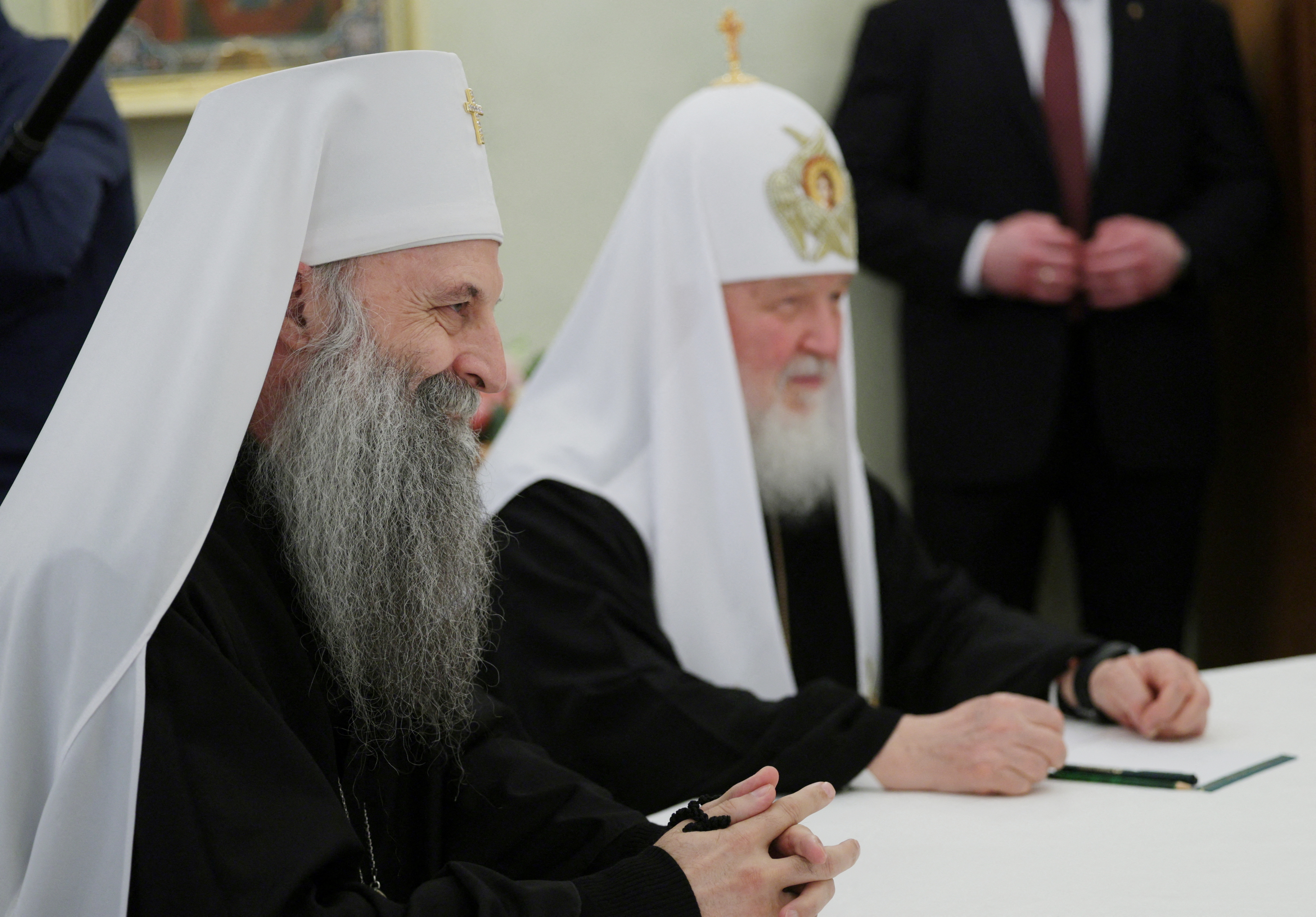 Russian President Vladimir Putin welcomes Serbian Patriarch Porfirije in Moscow