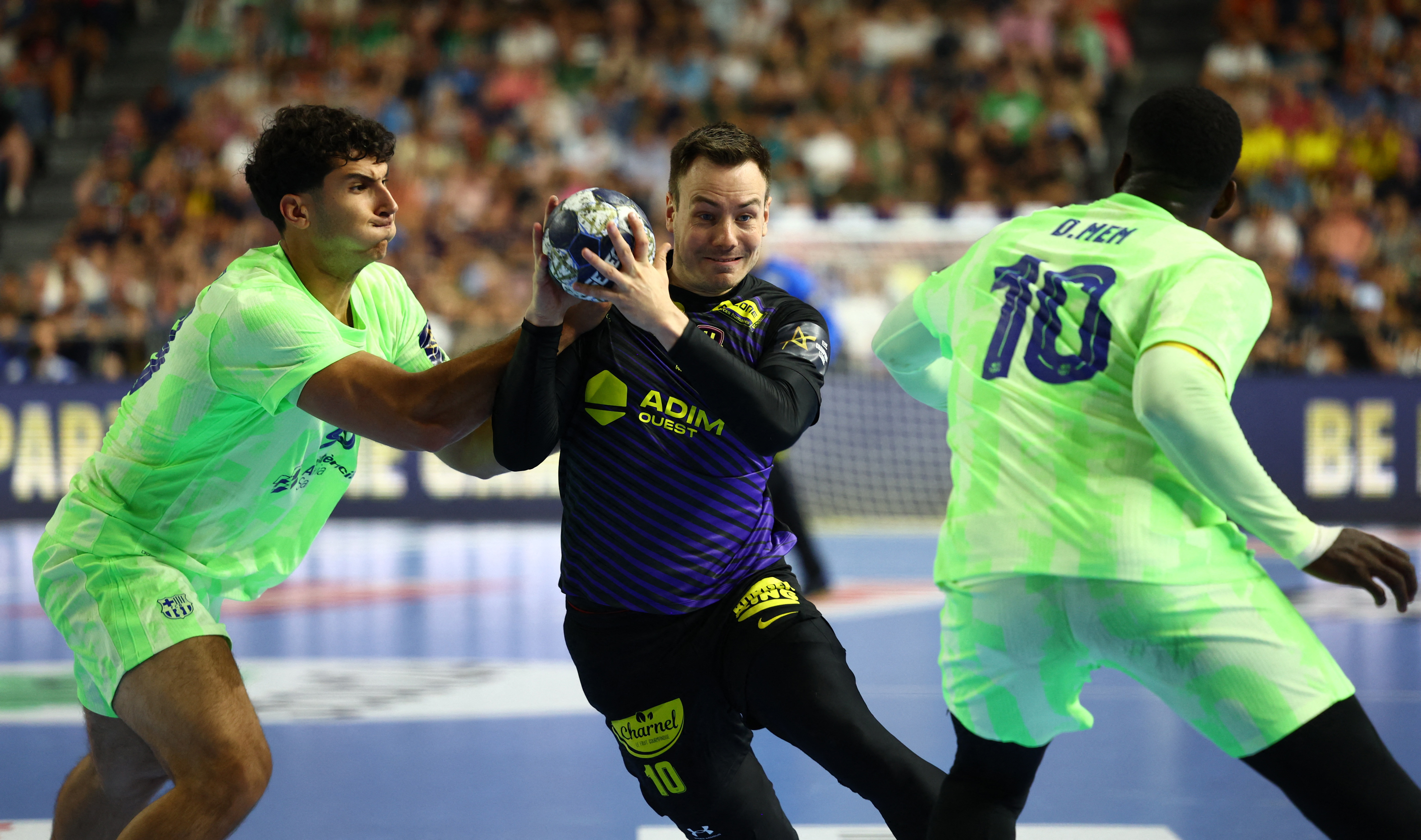 2025-06-15T142810Z_1979552512_UP1EL6F146W1U_RTRMADP_3_HANDBALL-CHAMPIONS