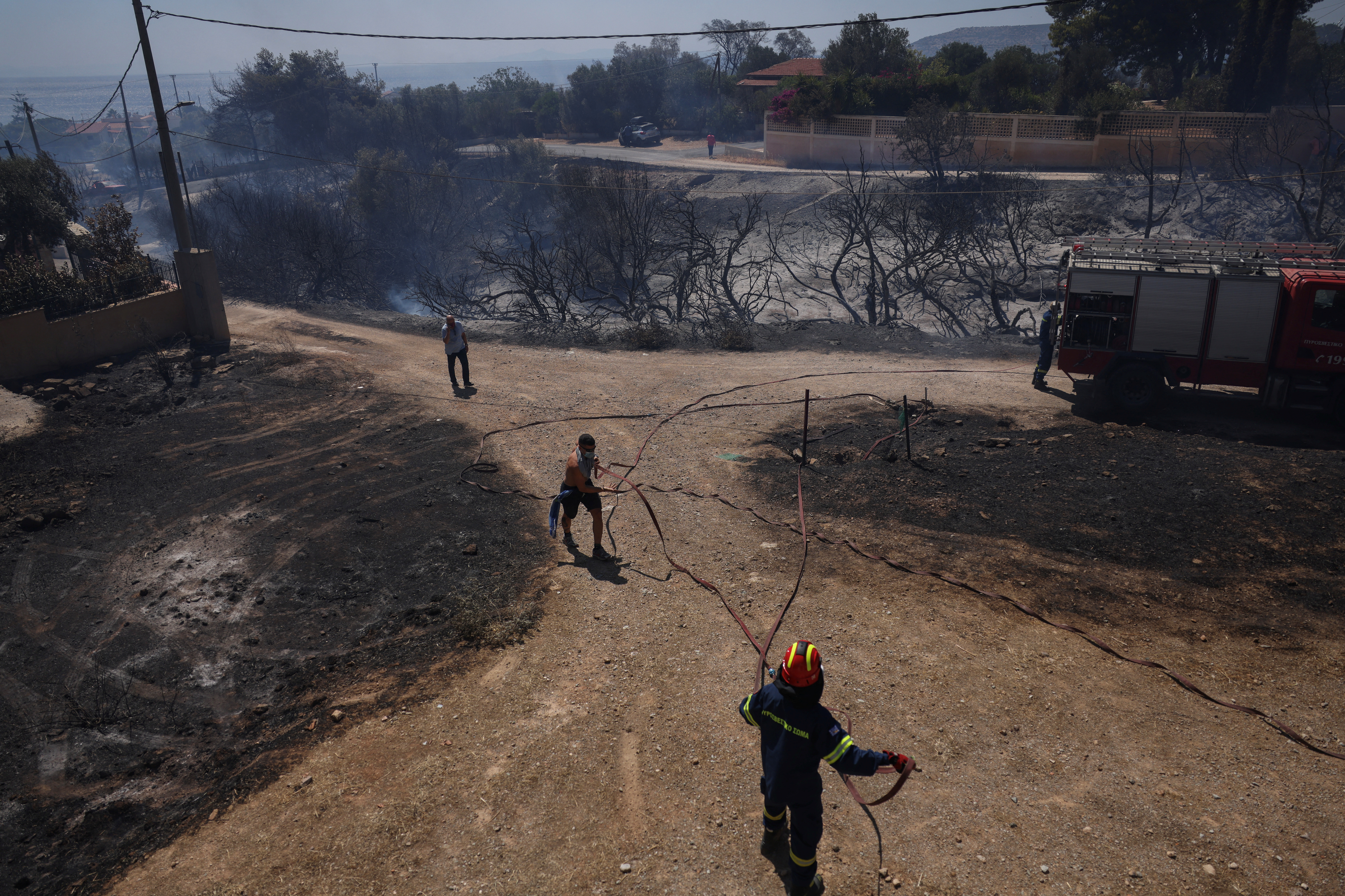 2025-06-26T145231Z_2040499770_RC2CAFA64Z3H_RTRMADP_3_EUROPE-WEATHER-GREECE-WILDFIRE