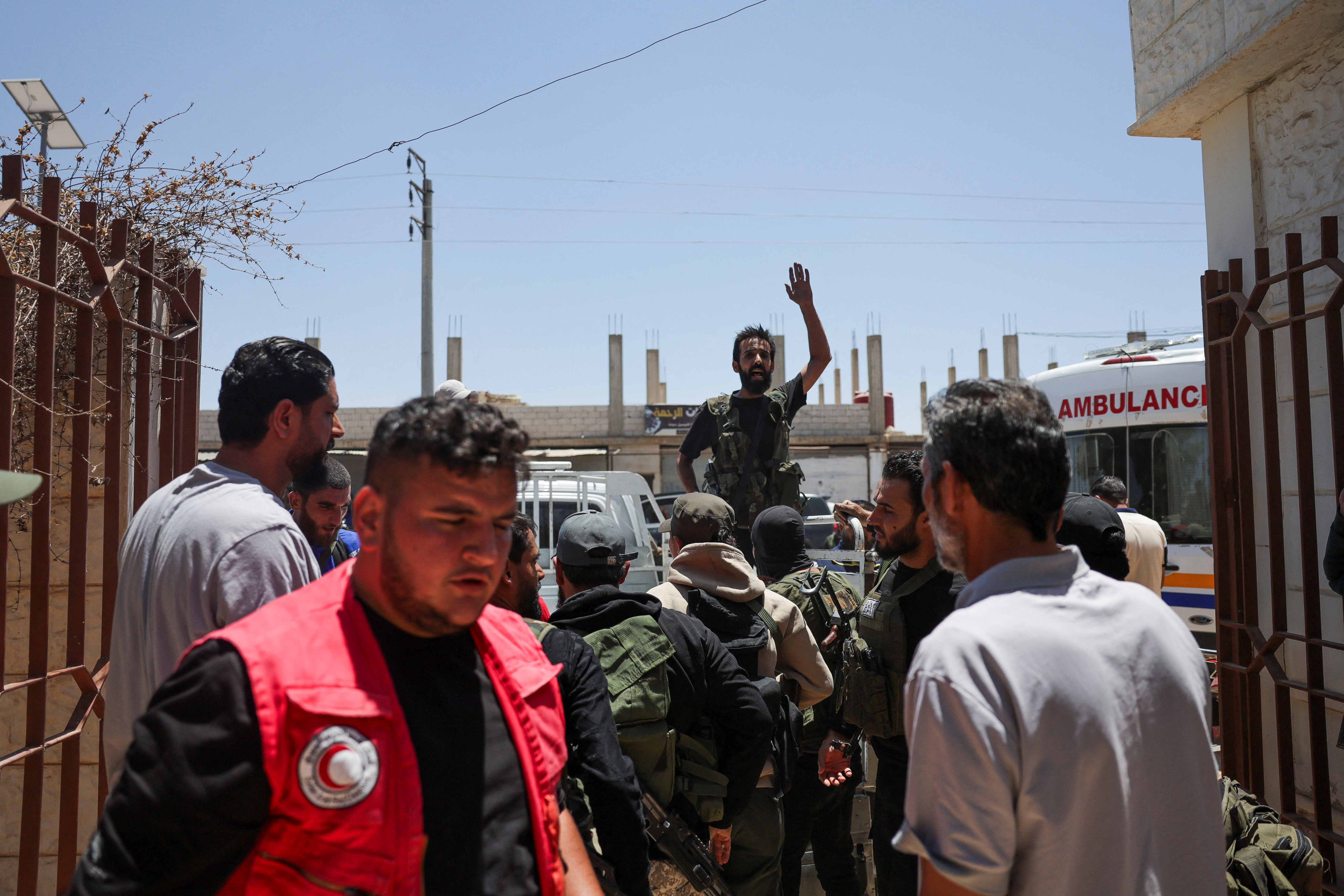 Casualties from recent clashes in Sweida receive treatment at a field medical point in Deraa
