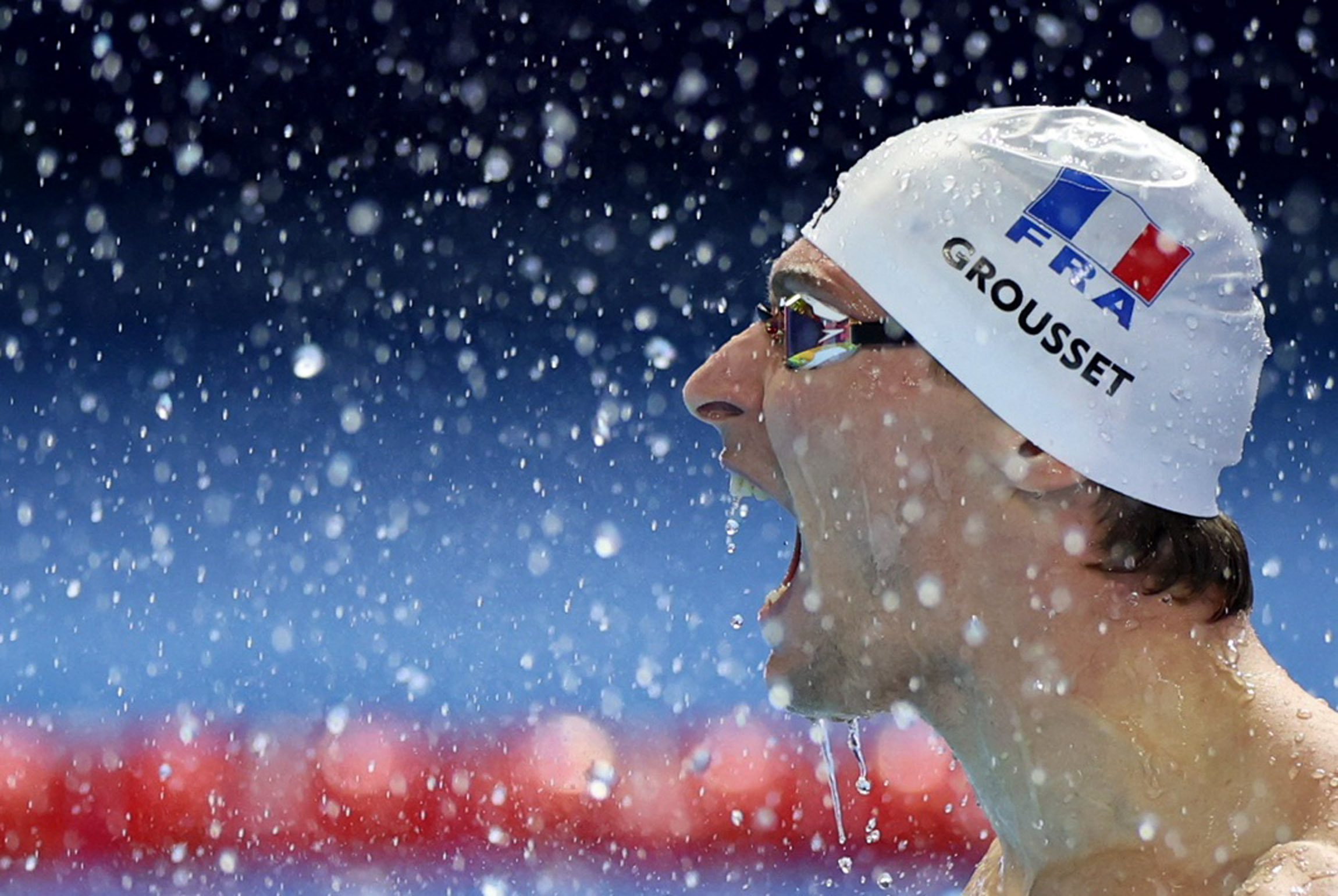 Swimming - World Aquatics Championships - Men 100m Butterfly Finals - World Aquatics Championships Arena, Singapore - August 2, 2025 France's Maxime Grousset celebrates after winning the final REUTERS/Hollie Adams