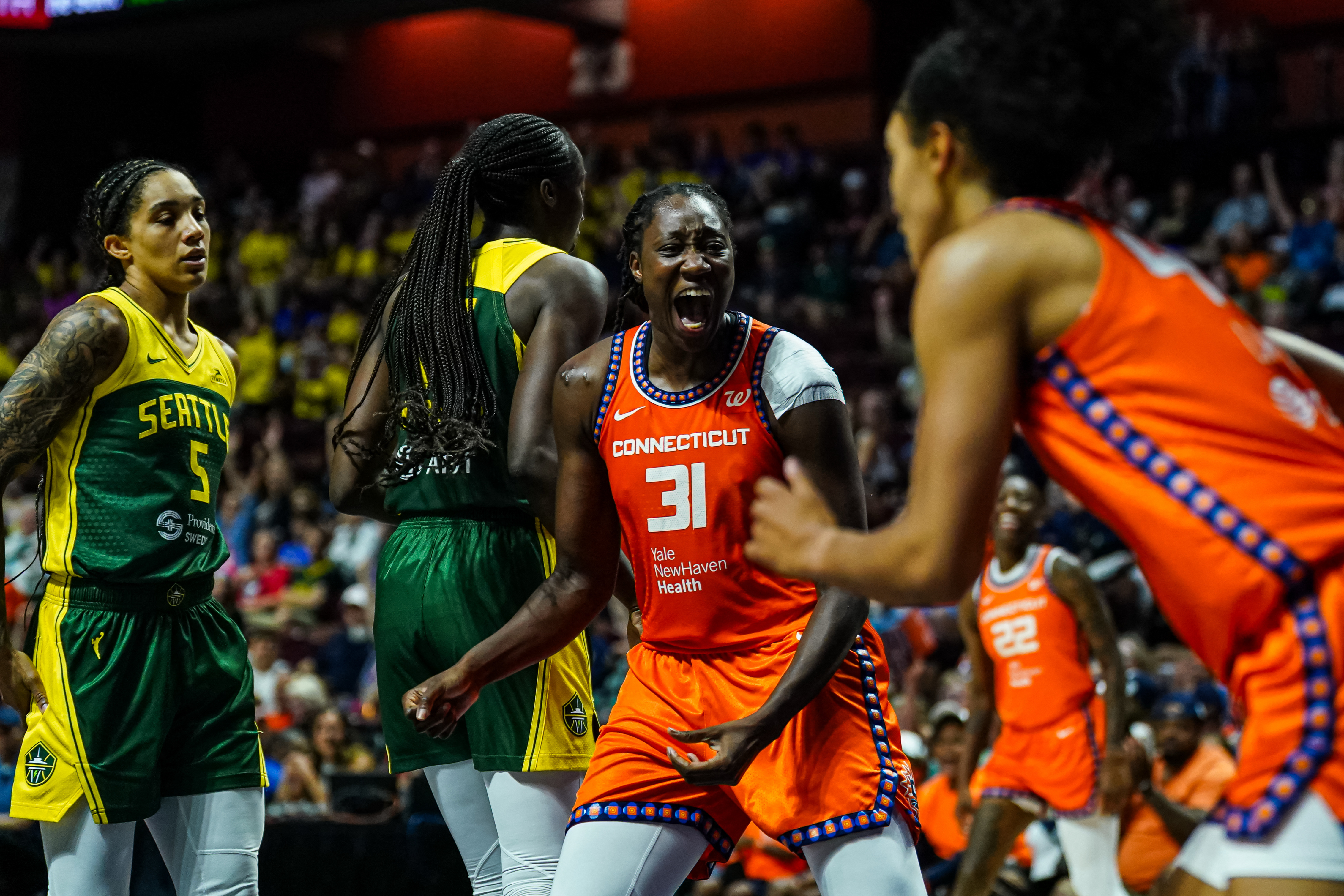 Jul 9, 2025; Uncasville, Connecticut, USA; Connecticut Sun center Tina Charles (31) reacts after a basket by guard Leila Lacan (47) against the Seattle Storm in the second half at Mohegan Sun Arena. Mandatory Credit: David Butler II-Imagn Images