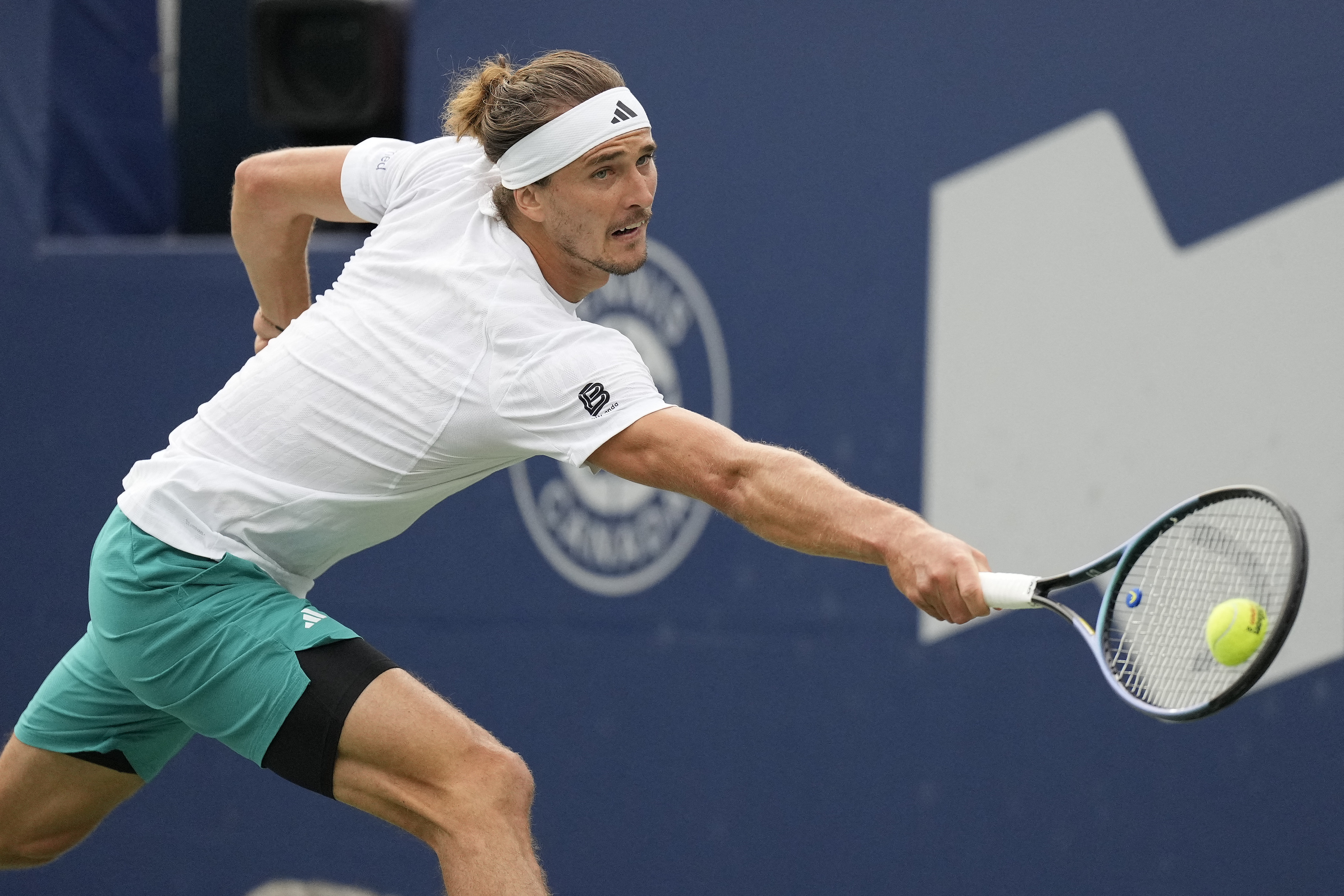 Aug 4, 2025; Toronto, ON, Canada; Alexander Zverev (GER) reaches to backhand a ball to Alexei Popyrin (not pictured) during quarterfinals at Sobeys Stadium. Mandatory Credit: John E. Sokolowski-Imagn Images