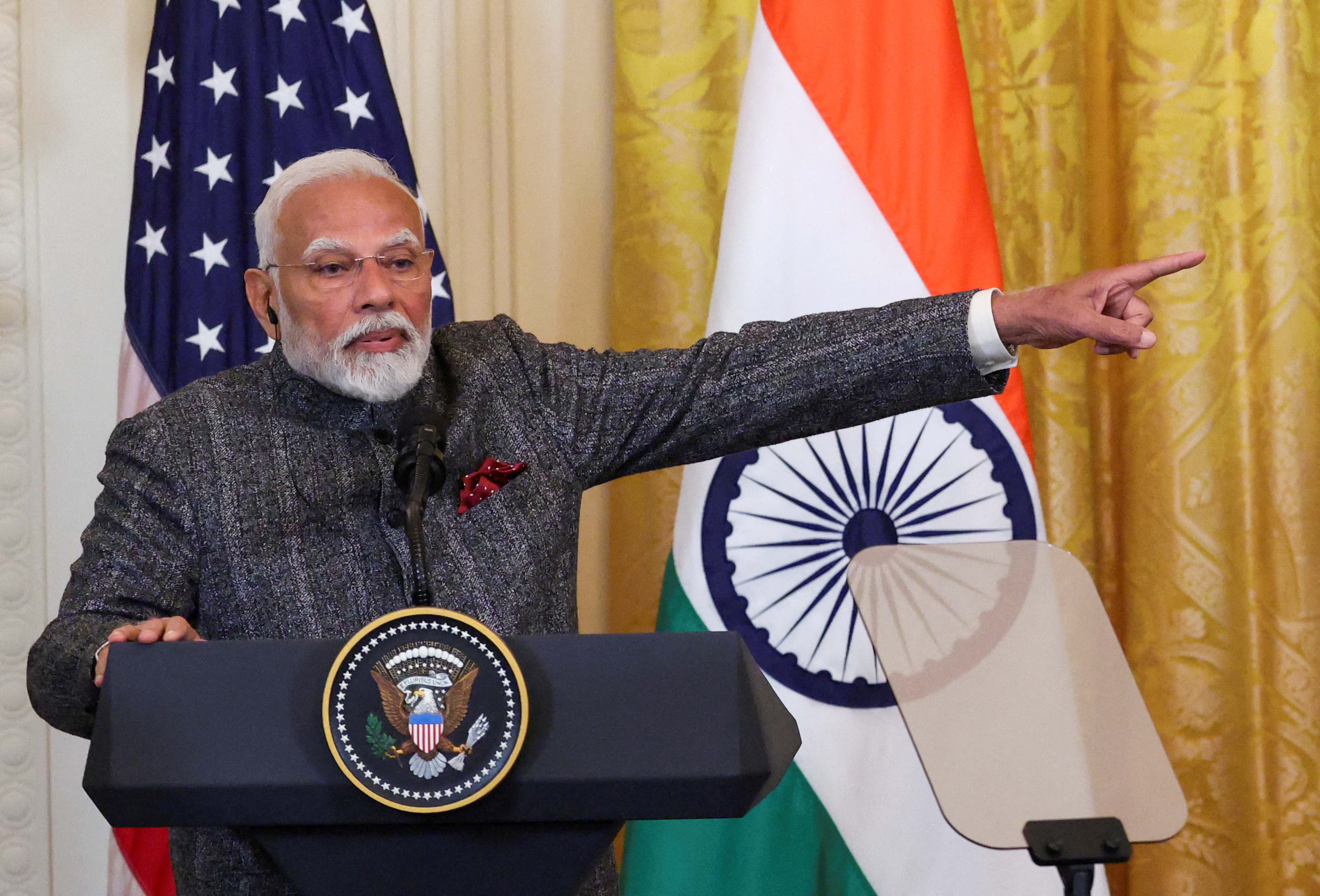 FILE PHOTO: Indian Prime Minister Narendra Modi gestures during a joint press conference with U.S. President Donald Trump at the White House in Washington, D.C., U.S., February 13, 2025. REUTERS/Kevin Lamarque/File Photo