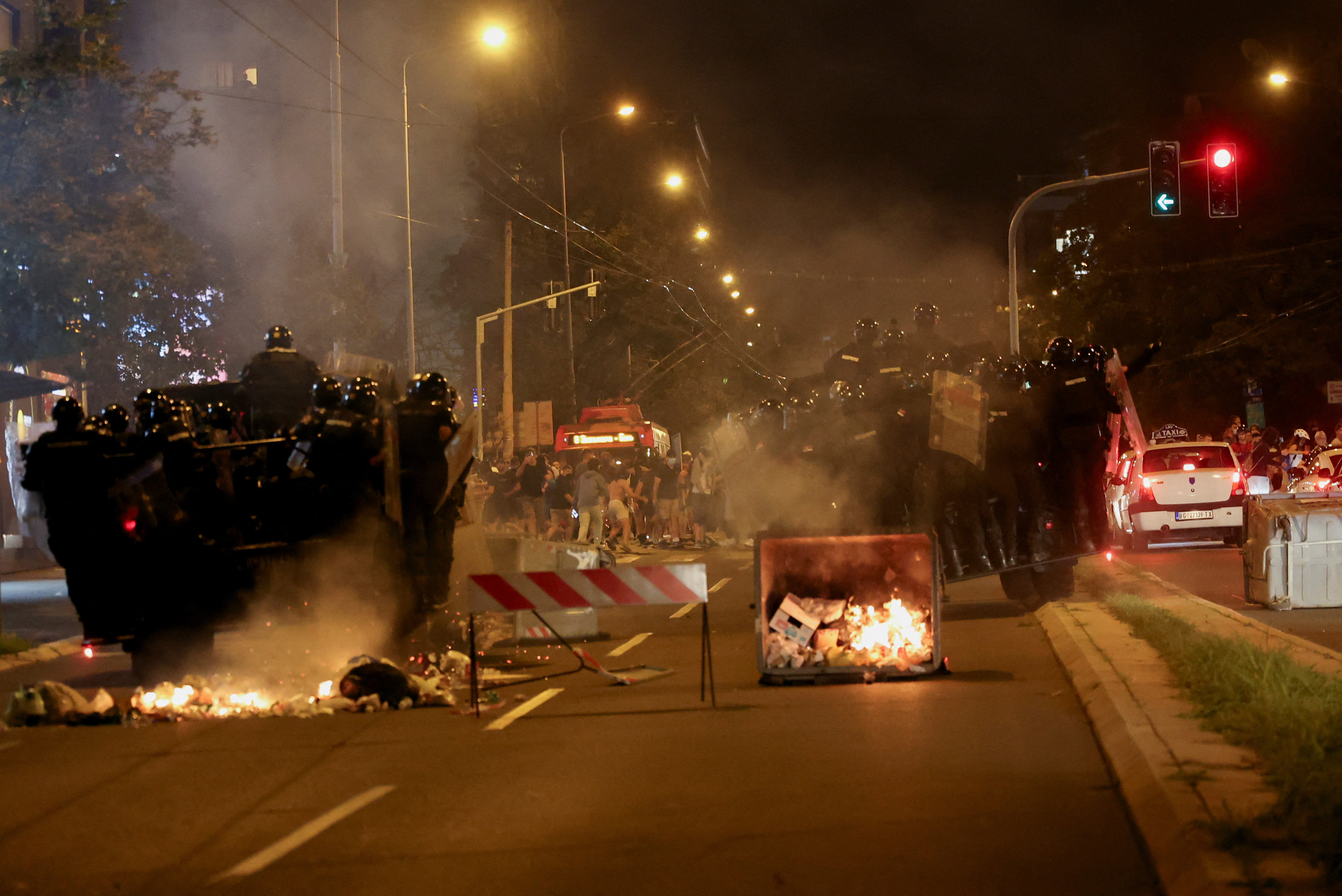 Police officers operate during clashes with anti-government protesters in Belgrade, Serbia, August 18, 2025. REUTERS/Zorana Jevtic