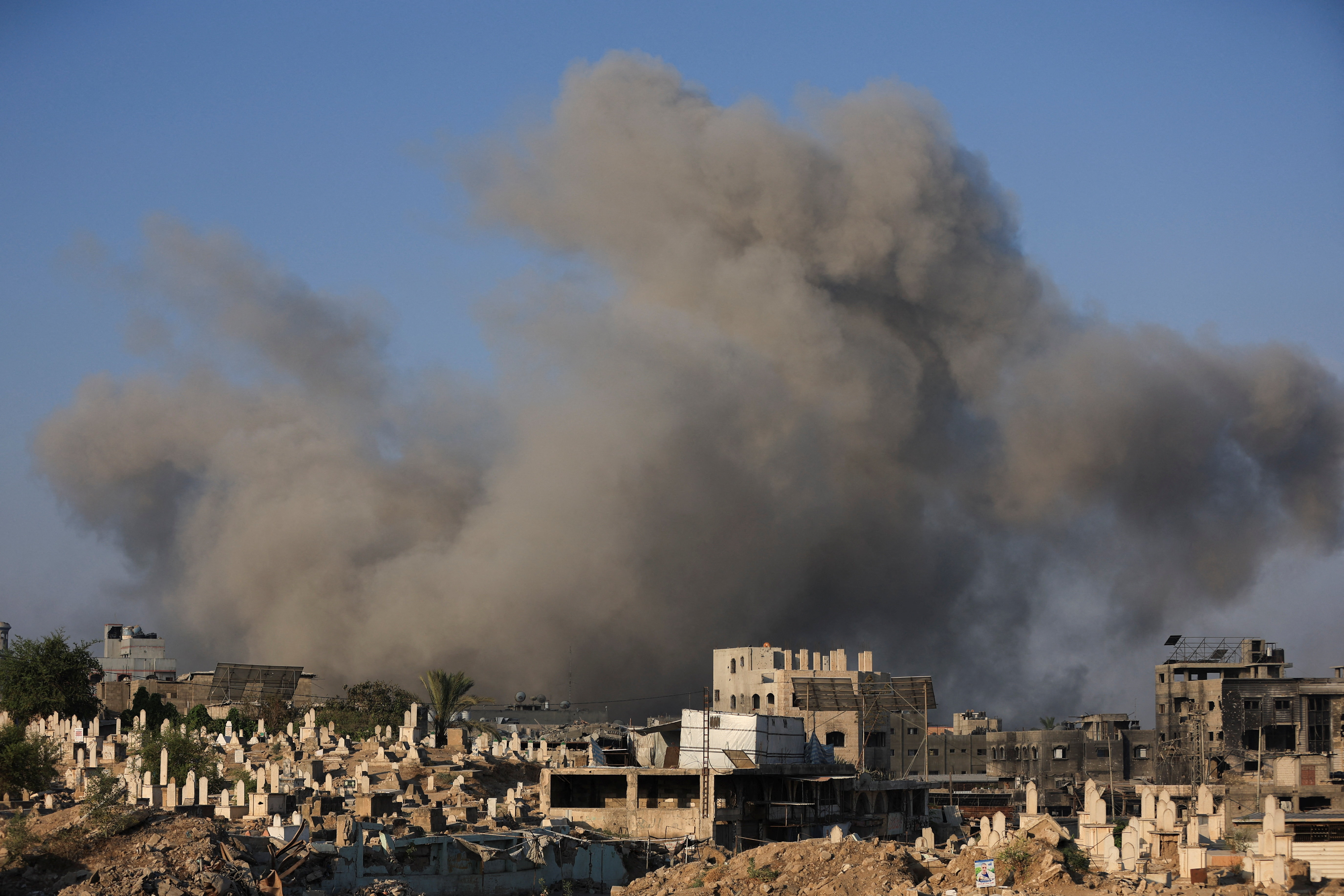 Smoke rises following an Israeli strike, in Gaza City, August 23, 2025. REUTERS/Dawoud Abu Alkas