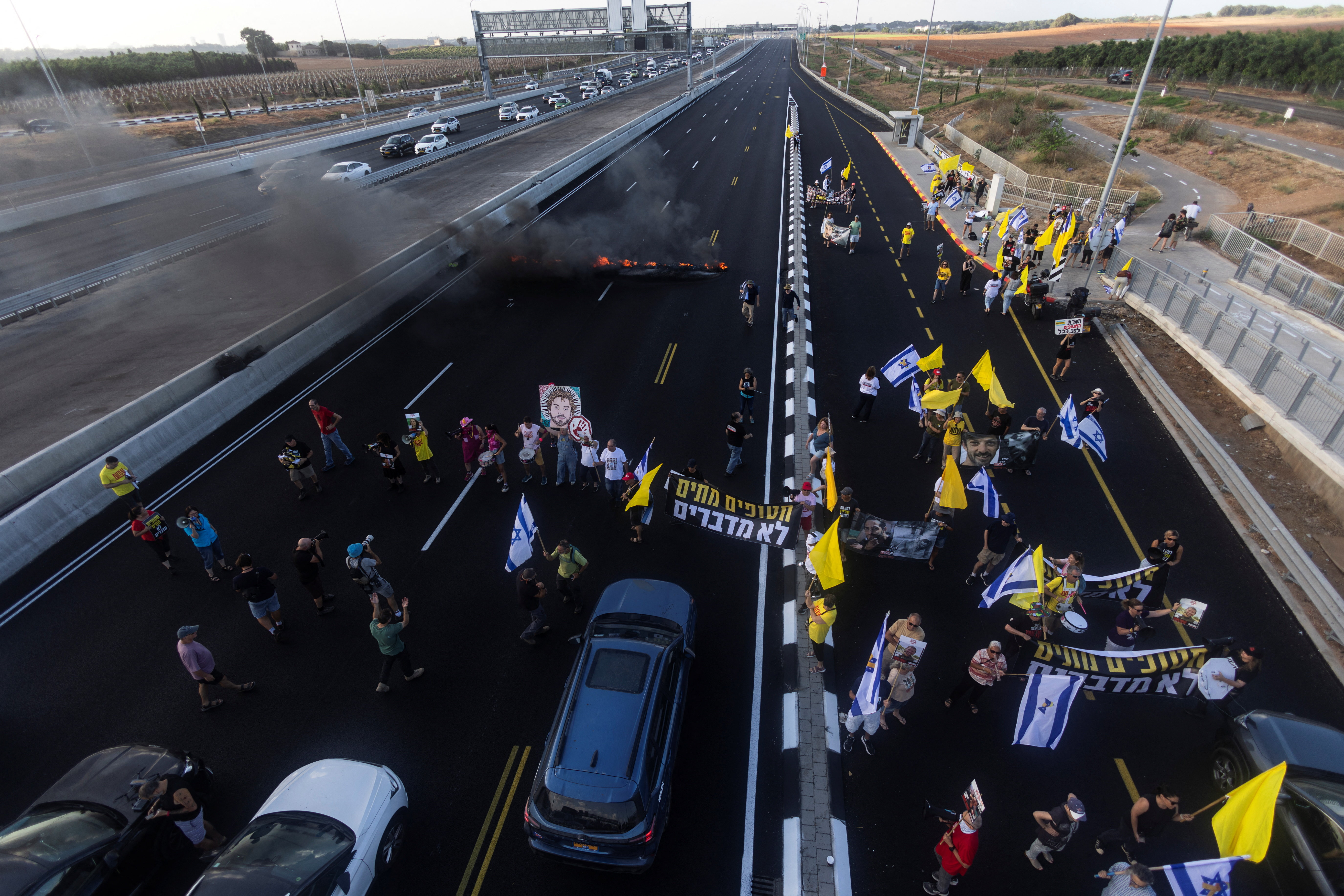 Demonstration demanding the immediate end of the war and the release of all hostages who were kidnapped during the deadly October 7, 2023, attack on Israel by Hamas, in Tel Aviv, Israel, August 26, 2025. REUTERS/Aviv Atlas