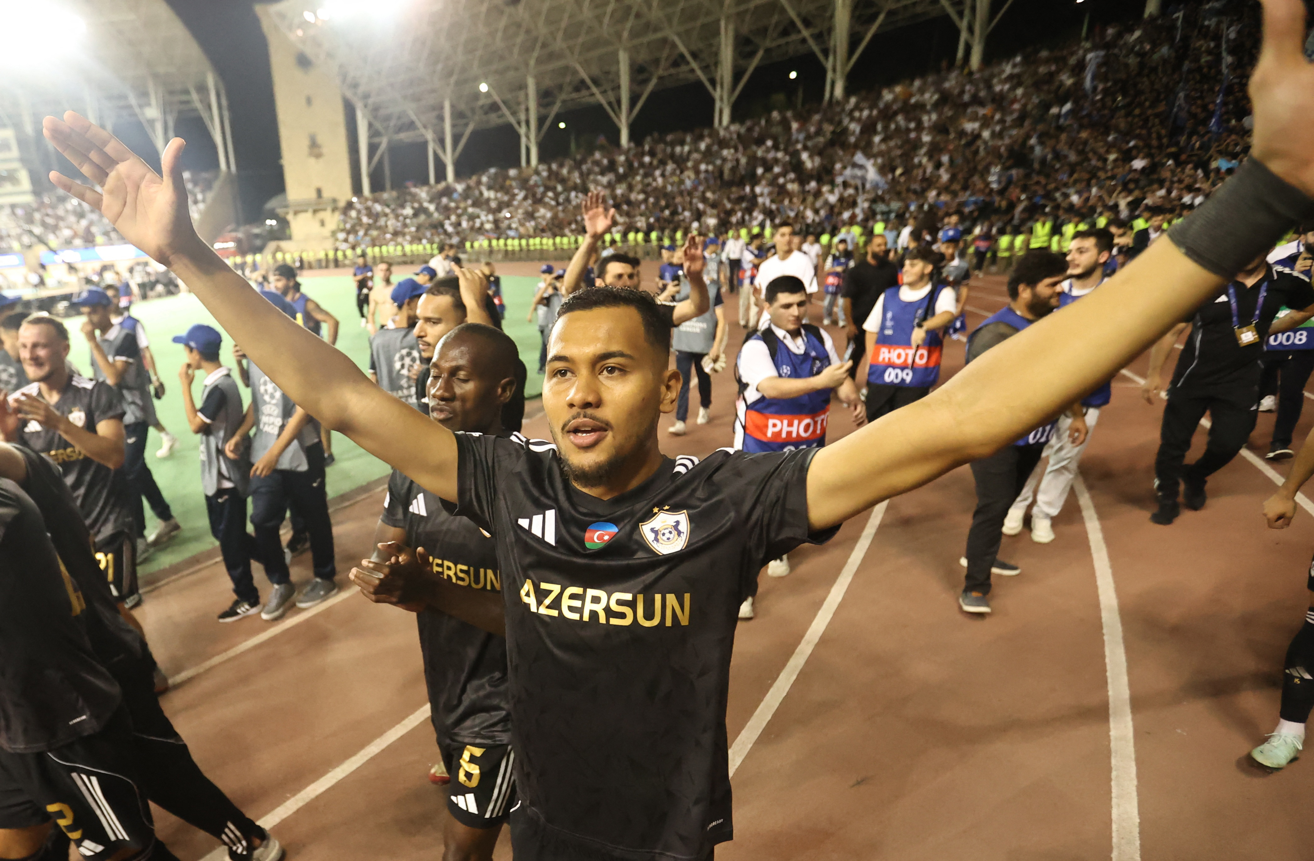 Soccer Football - UEFA Champions League - Play Off - Second Leg - Qarabag v Ferencvaros - Tofiq Bahramov Republican Stadium, Baku, Azerbaijan - August 27, 2025 Qarabag's Daniel celebrates after qualifying for the UEFA Champions League REUTERS/Aziz Karimov