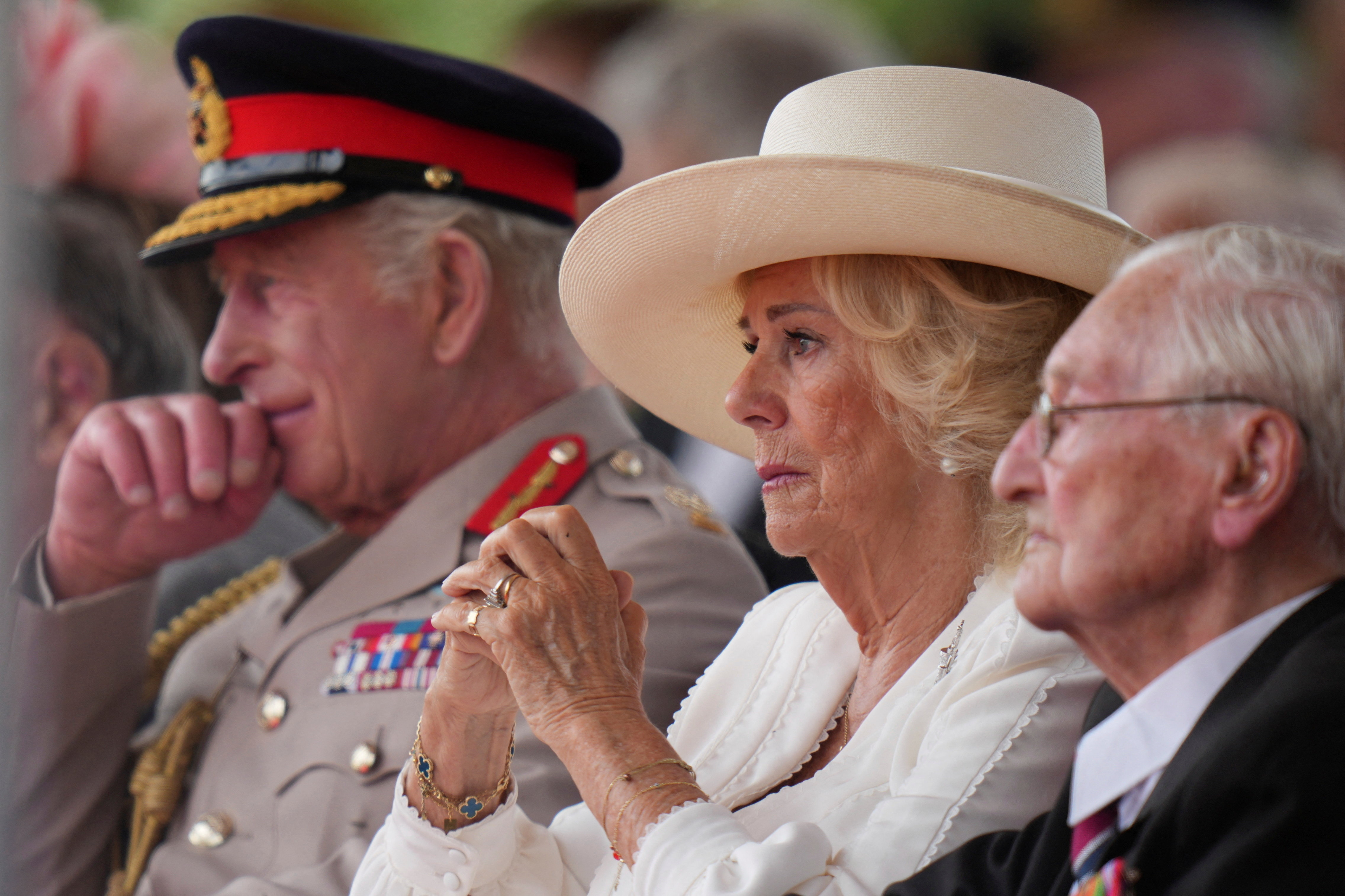 Britain's King Charles and Queen Camilla attend a Service of Remembrance at the National Memorial Arboretum to commemorate the 80th Anniversary of