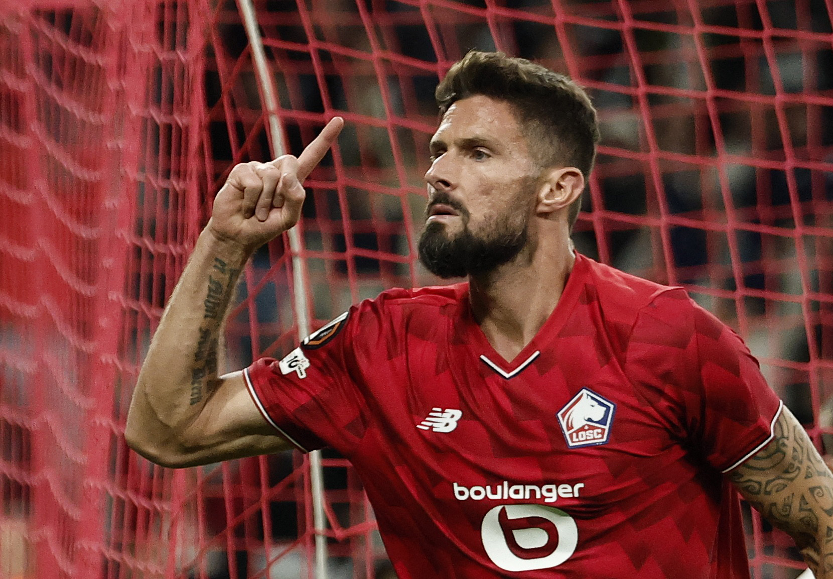 Soccer Football - UEFA Europa League - Lille v Brann - Decathlon Arena Stade Pierre-Mauroy, Villeneuve-d'Ascq, France - September 25, 2025 Lille's Olivier Giroud celebrates scoring their second goal REUTERS/Benoit Tessier