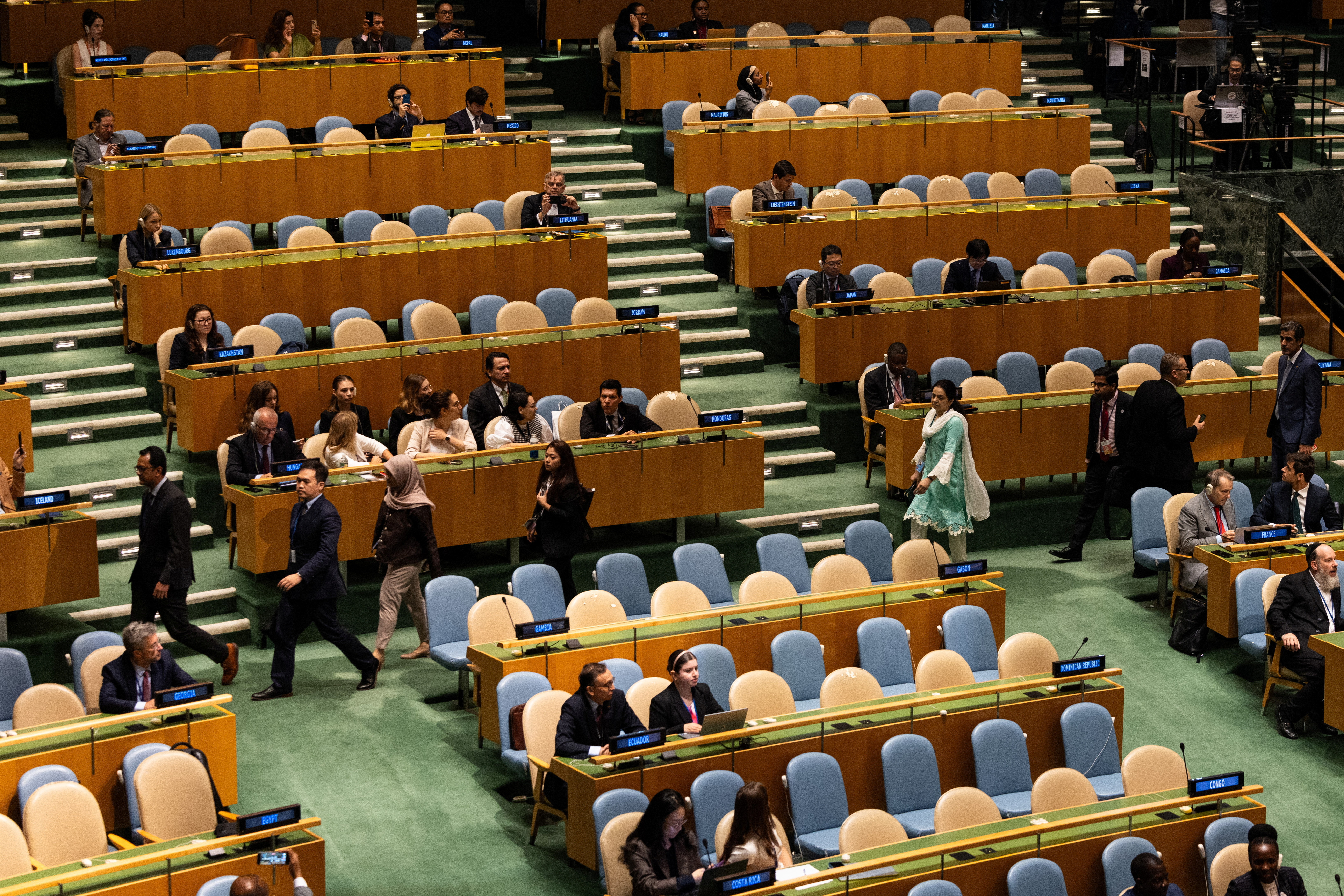 Delegates walk out before Israeli Prime Minister Benjamin Netanyahu addresses the 80th United Nations General Assembly (UNGA), at the U.N. headquarters in New York