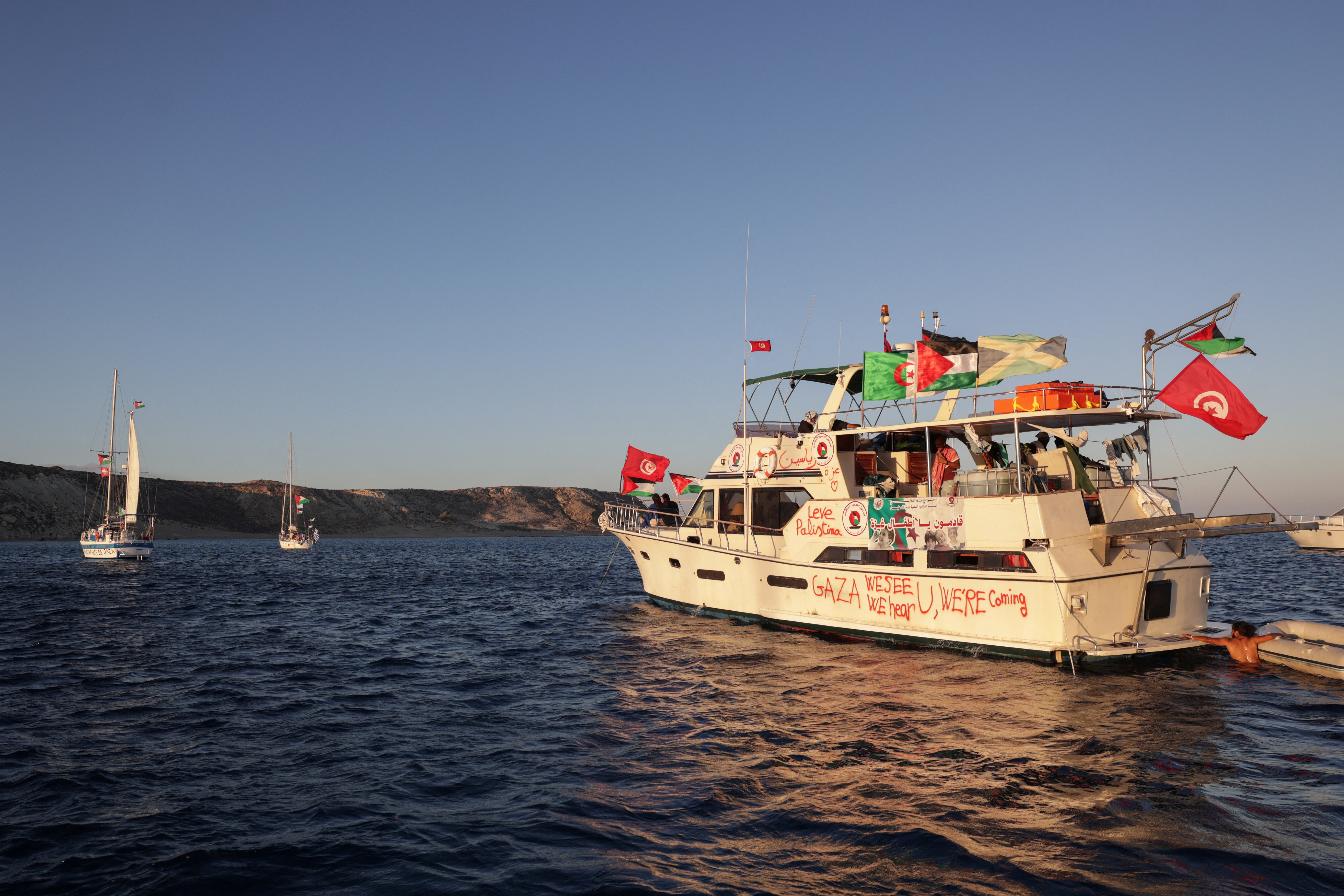 Boats, part of the Global Sumud Flotilla aiming to reach Gaza and break Israel's naval blockade, sail off Koufonisi islet, Greece, September 26, 2025. REUTERS/Stefanos Rapanis