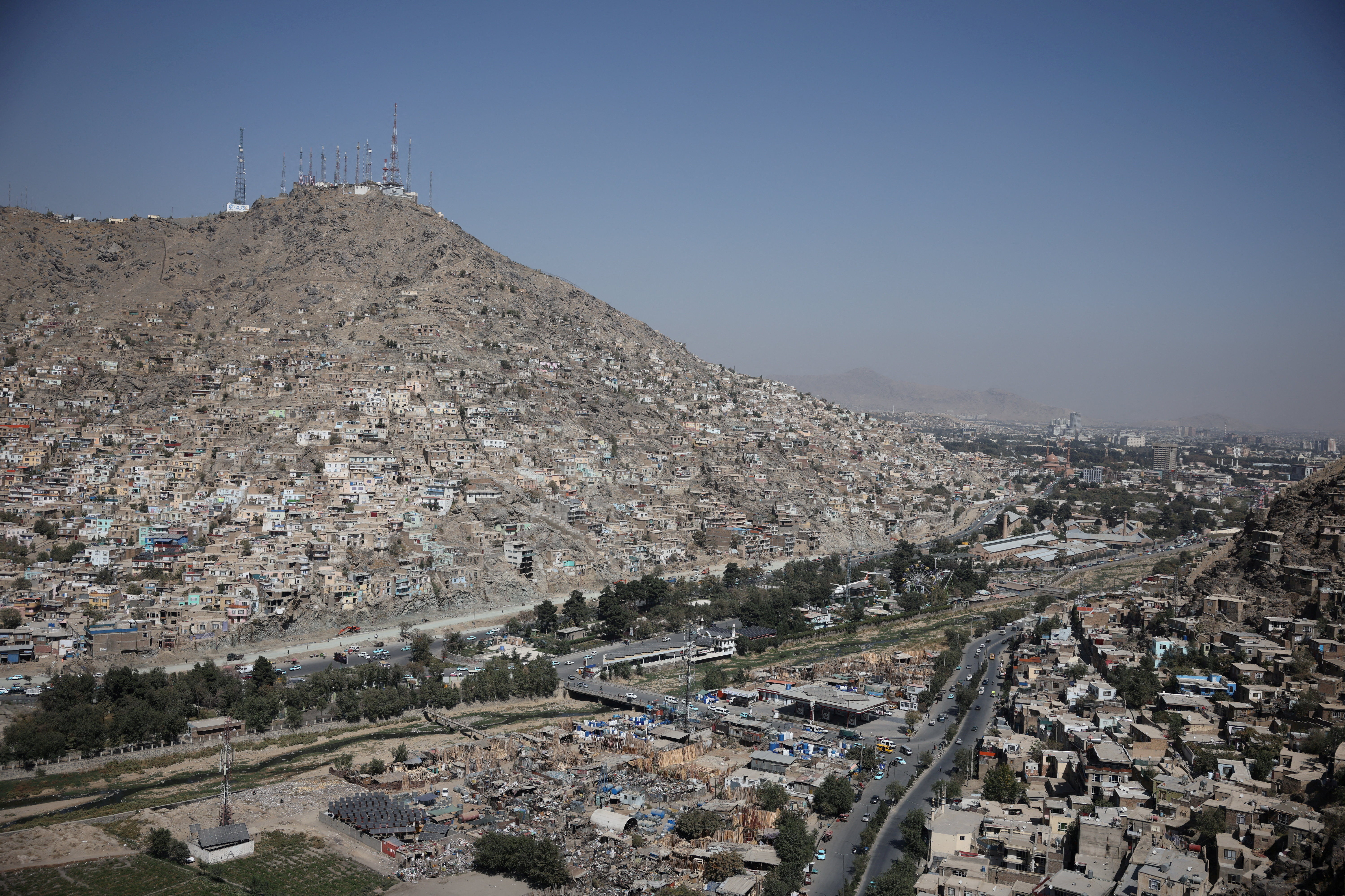 Telecom antennas stand on top of a hill, amid telecom shutdown across the country, in Kabul, Afghanistan