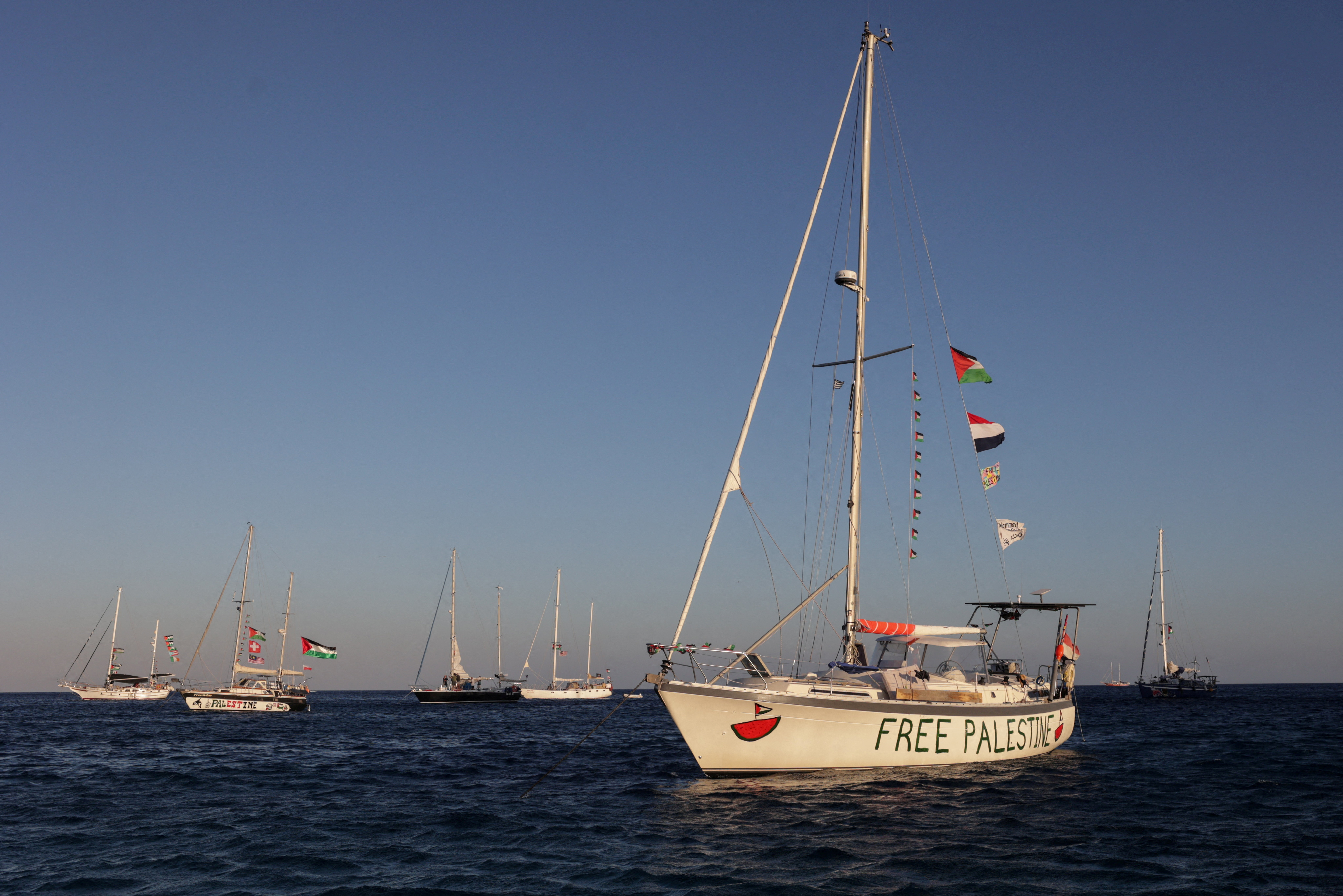 FILE PHOTO: Sailing boats, part of the Global Sumud Flotilla aiming to reach Gaza and break Israel's naval blockade, sail off  Koufonisi islet, Greece