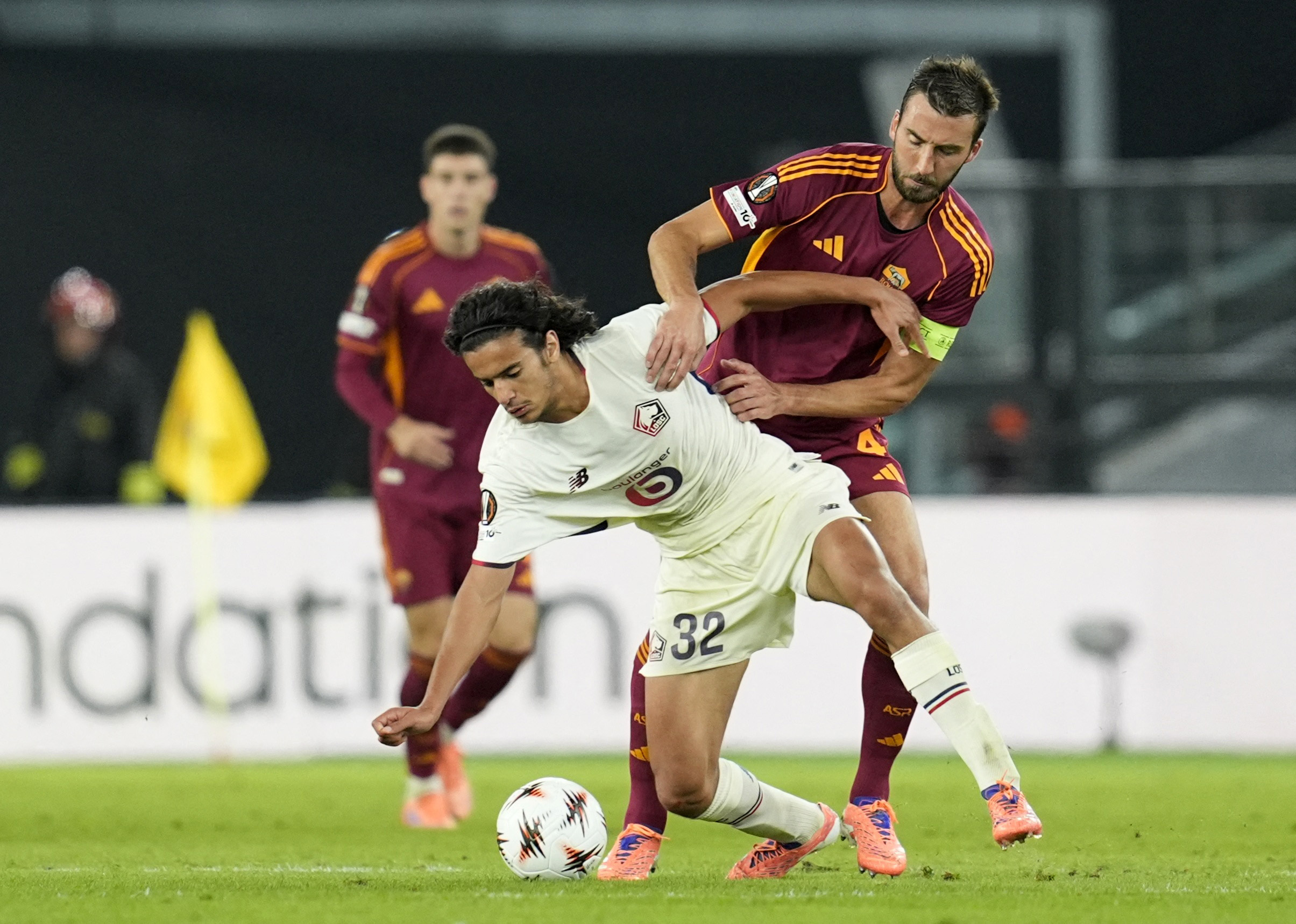 Soccer Football - UEFA Europa League - AS Roma v Lille - Stadio Olimpico, Rome, Italy - October 2, 2025 Lille's Ayyoub Bouaddi in action with AS Roma's Bryan Cristante REUTERS/Matteo Ciambelli