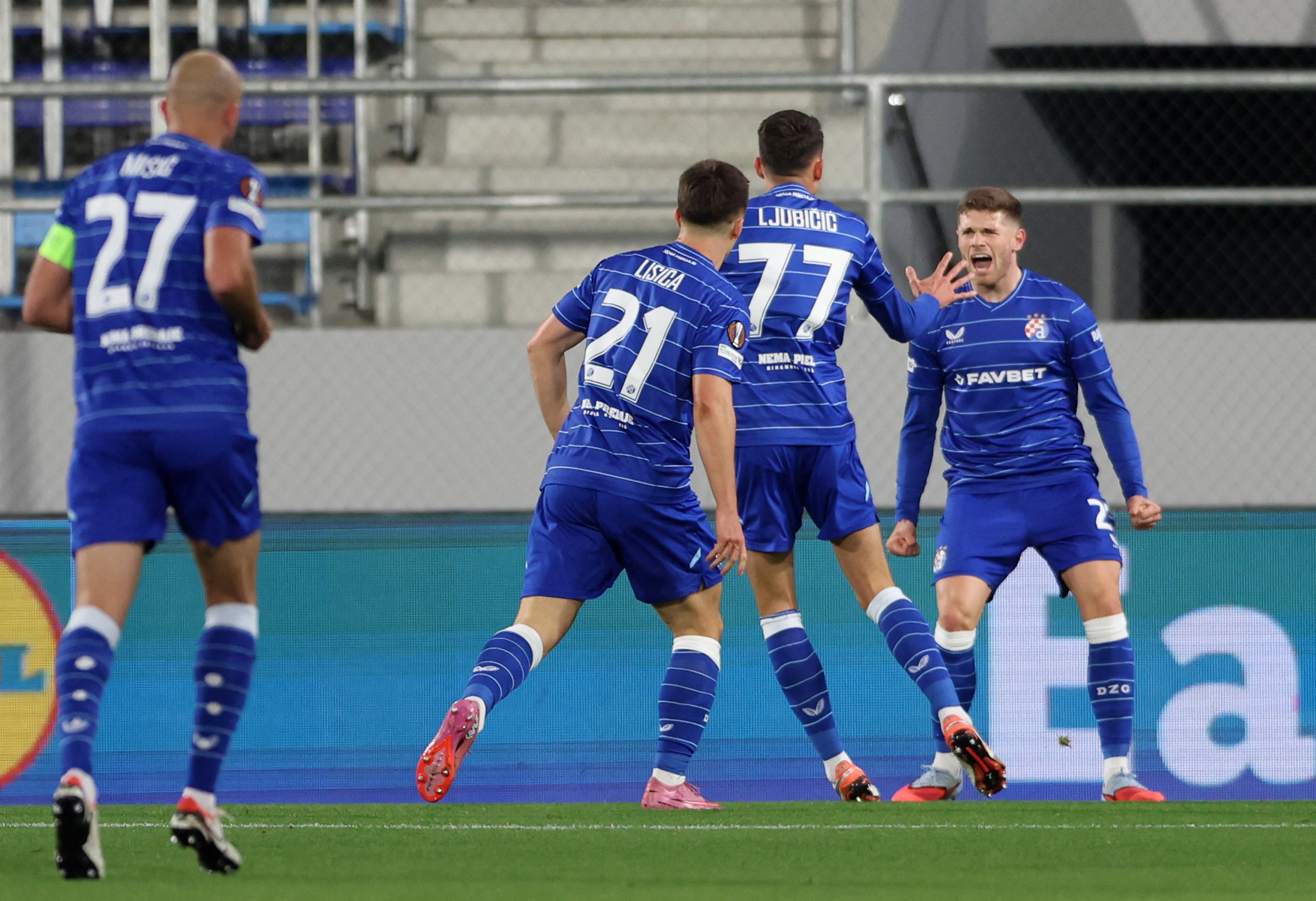 Soccer Football - UEFA Europa League - Maccabi Tel Aviv v GNK Dinamo Zagreb - TSC Arena, Topola, Serbia - October 2, 2025 GNK Dinamo Zagreb's Dejan Ljubicic celebrates scoring their second goal with teammates REUTERS/Zorana Jevtic