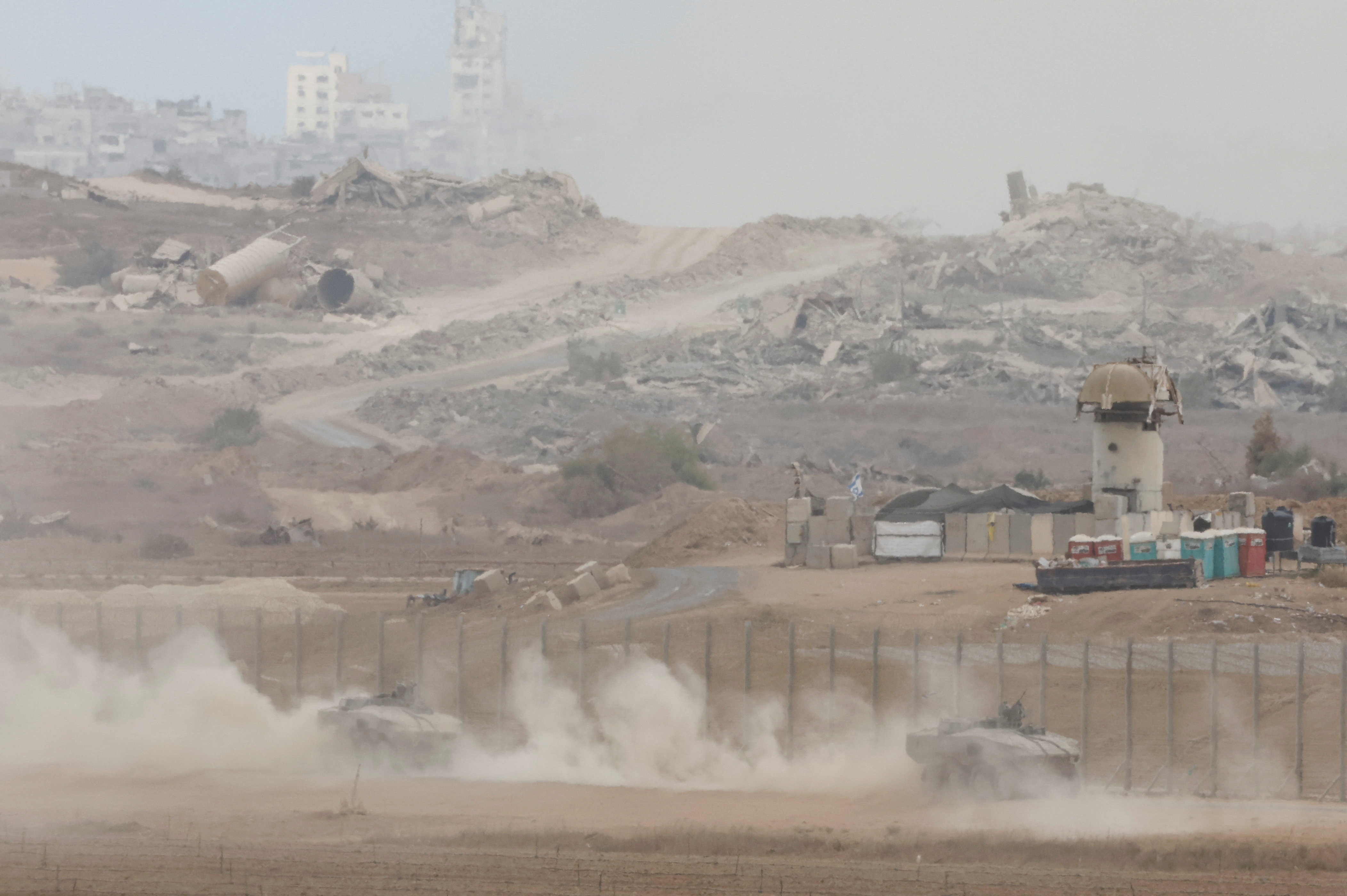 Israeli military vehicles manoeuvre