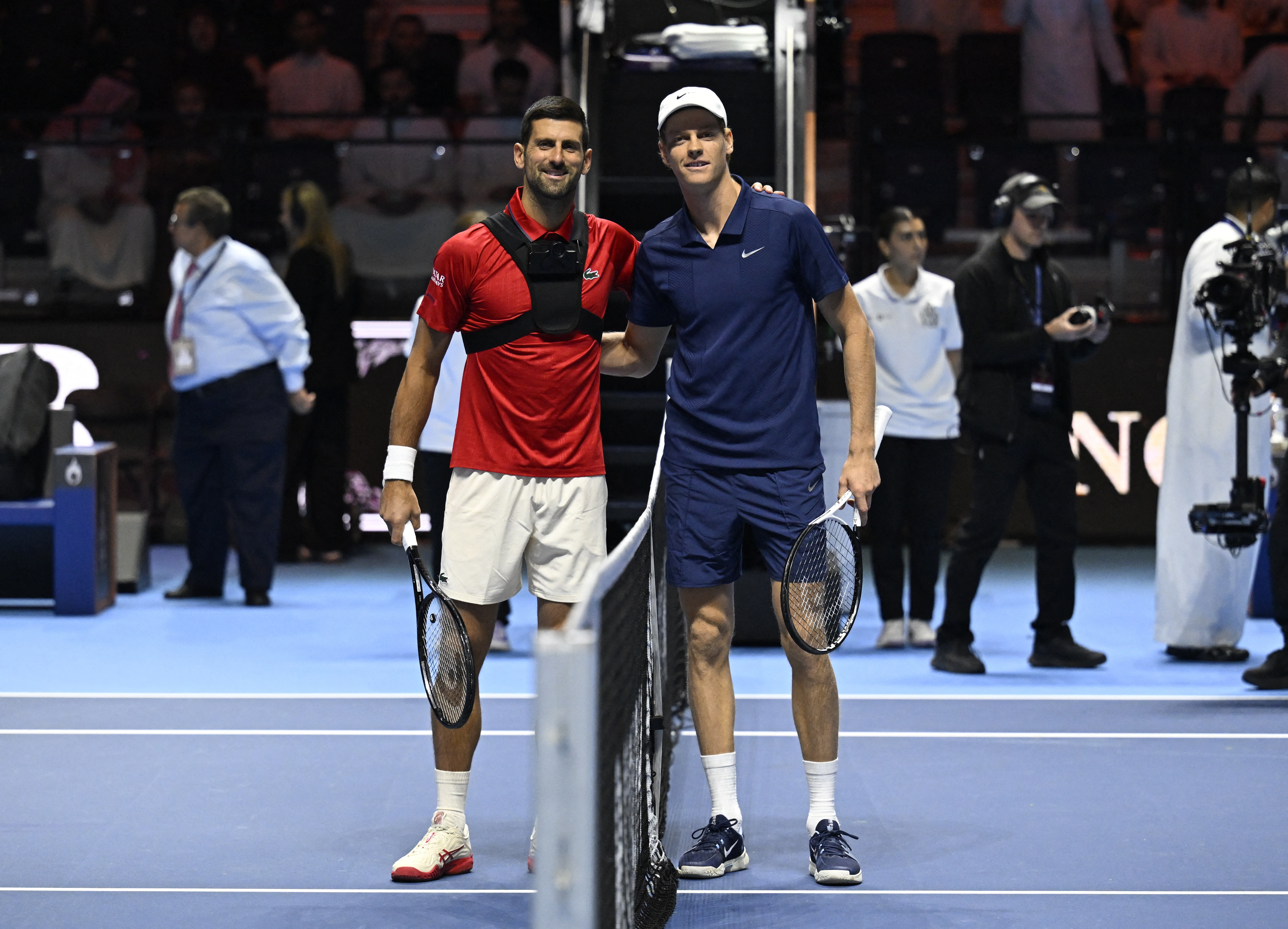 Tennis - Six Kings Slam - ANB Arena, Riyadh, Saudi Arabia - October 16, 2025 Serbia's Novak Djokovic and Italy's Jannik Sinner pose ahead of their semi final match REUTERS/Stringer