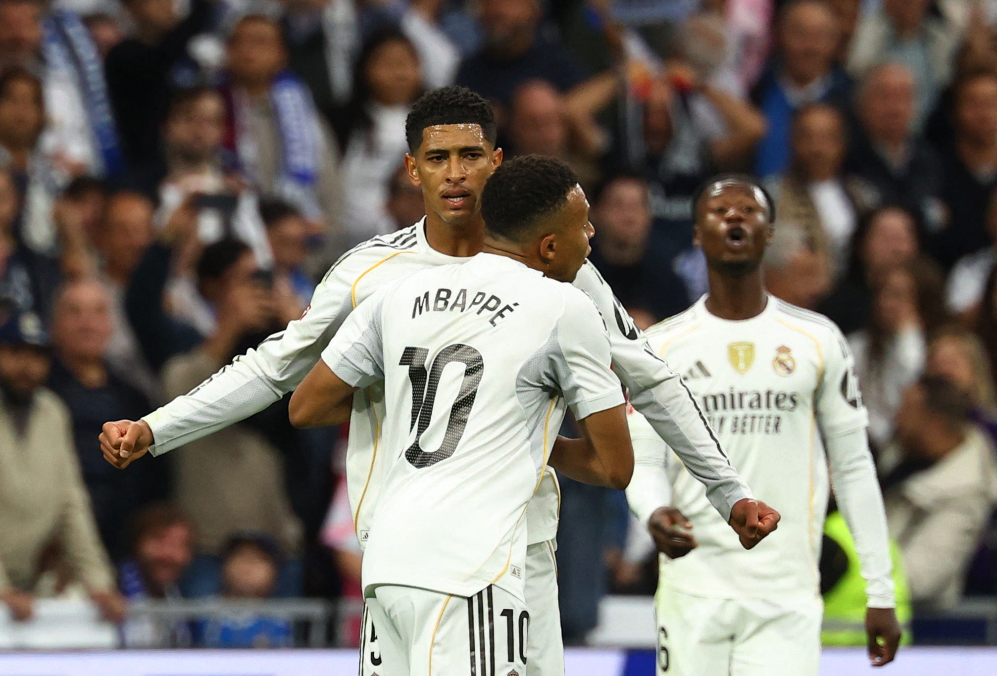 Soccer Football - LaLiga - Real Madrid v FC Barcelona - Santiago Bernabeu, Madrid, Spain - October 26, 2025 Real Madrid's Kylian Mbappe celebrates scoring their first goal with Jude Bellingham REUTERS/Susana Vera