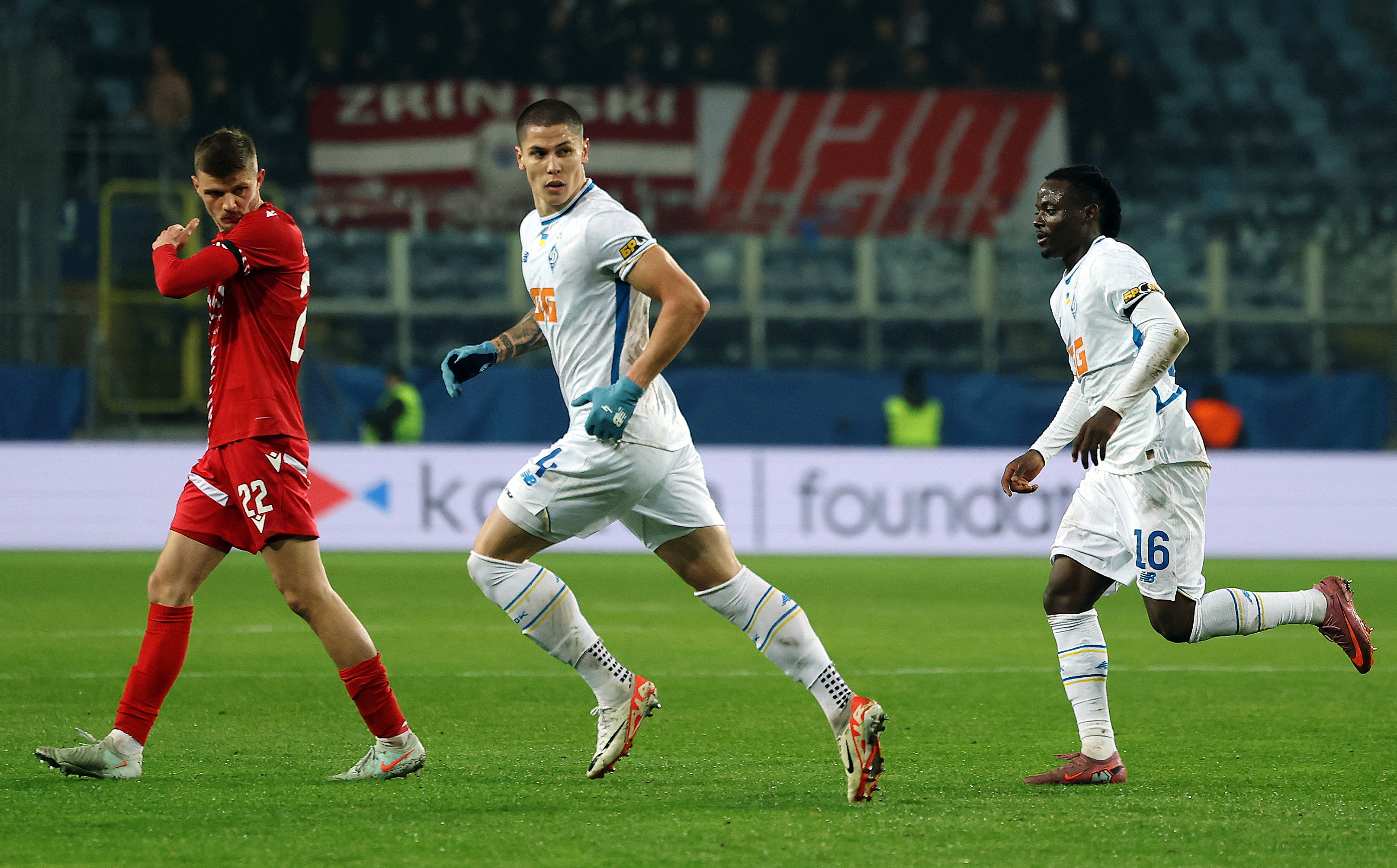 Soccer Football - UEFA Conference League - Dynamo Kyiv v Zrinjski Mostar - Lublin Arena, Lublin, Poland - November 6, 2025 Dynamo Kyiv's Denys Popov celebrates scoring their first goal with Shola Ogundana REUTERS/Kacper Pempel