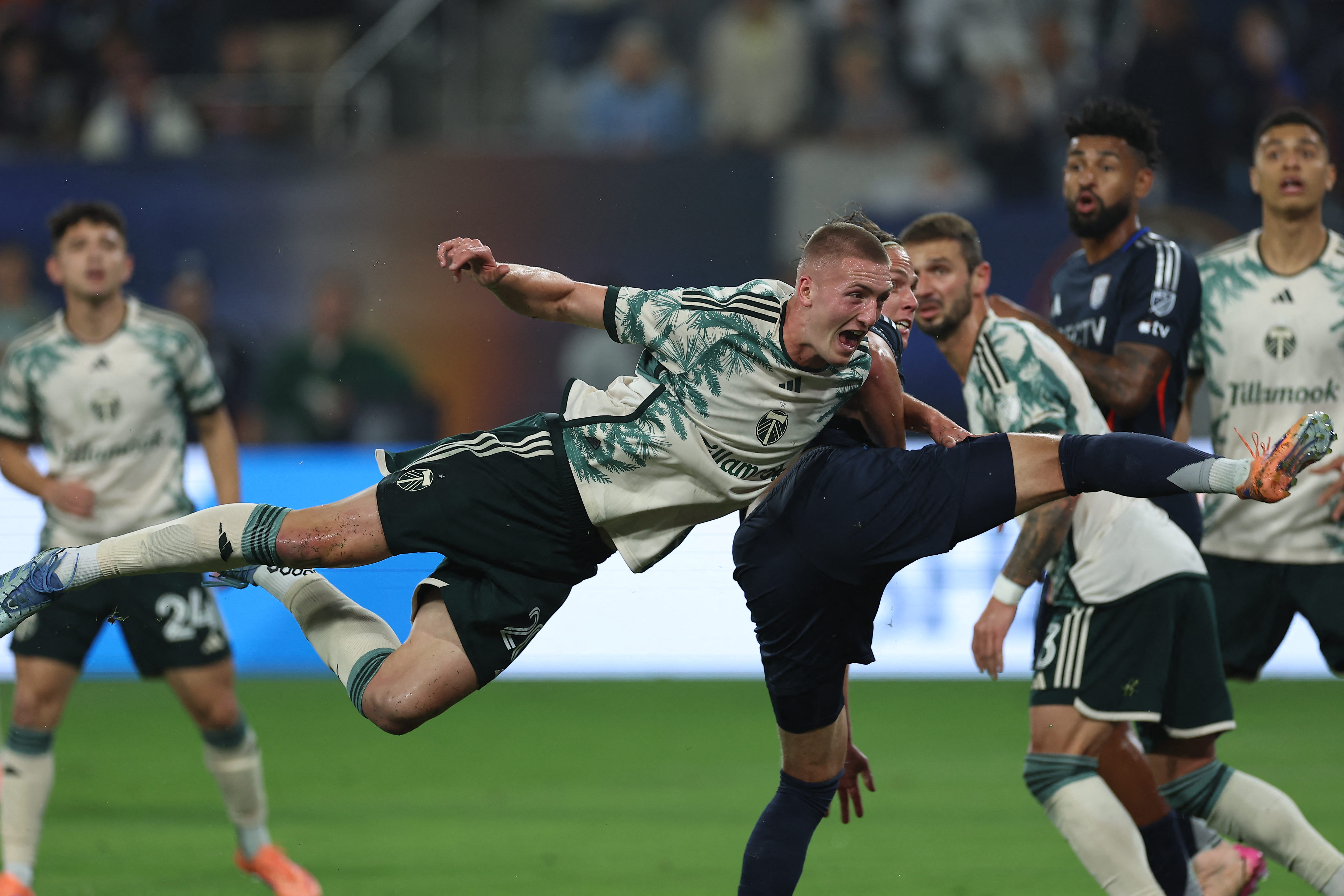 Nov 9, 2025; San Diego, California, USA; Portland Timbers defender Finn Surman (20) defends against San Diego FC midfielder Onni Valakari (8) during the first half at Snapdragon Stadium. Mandatory Credit: Abe Arredondo-Imagn Images