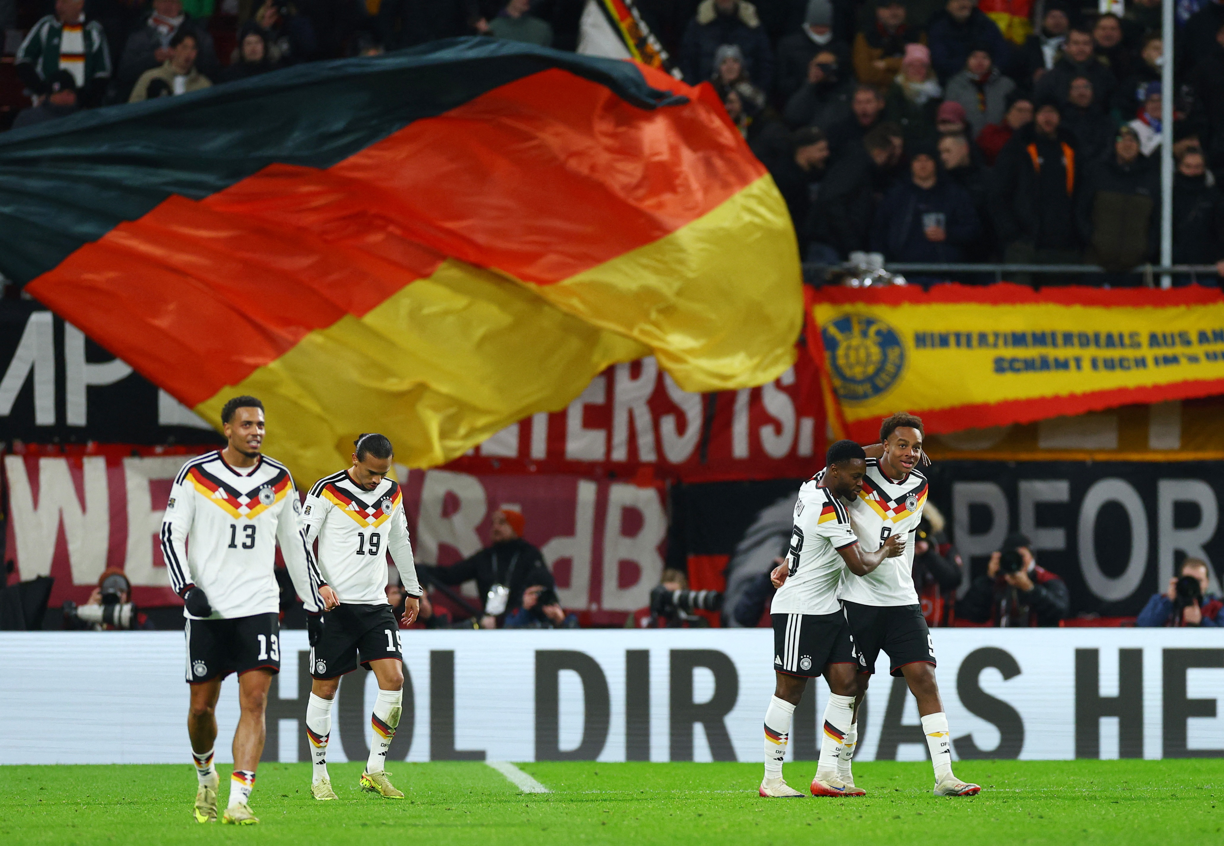Soccer Football - World Cup - UEFA Qualifiers - Group A - Germany v Slovakia - Red Bull Arena, Leipzig, Germany - November 17, 2025 Germany's Assan Ouedraogo celebrates scoring their sixth goal with Ridle Baku REUTERS/Lisi Niesner