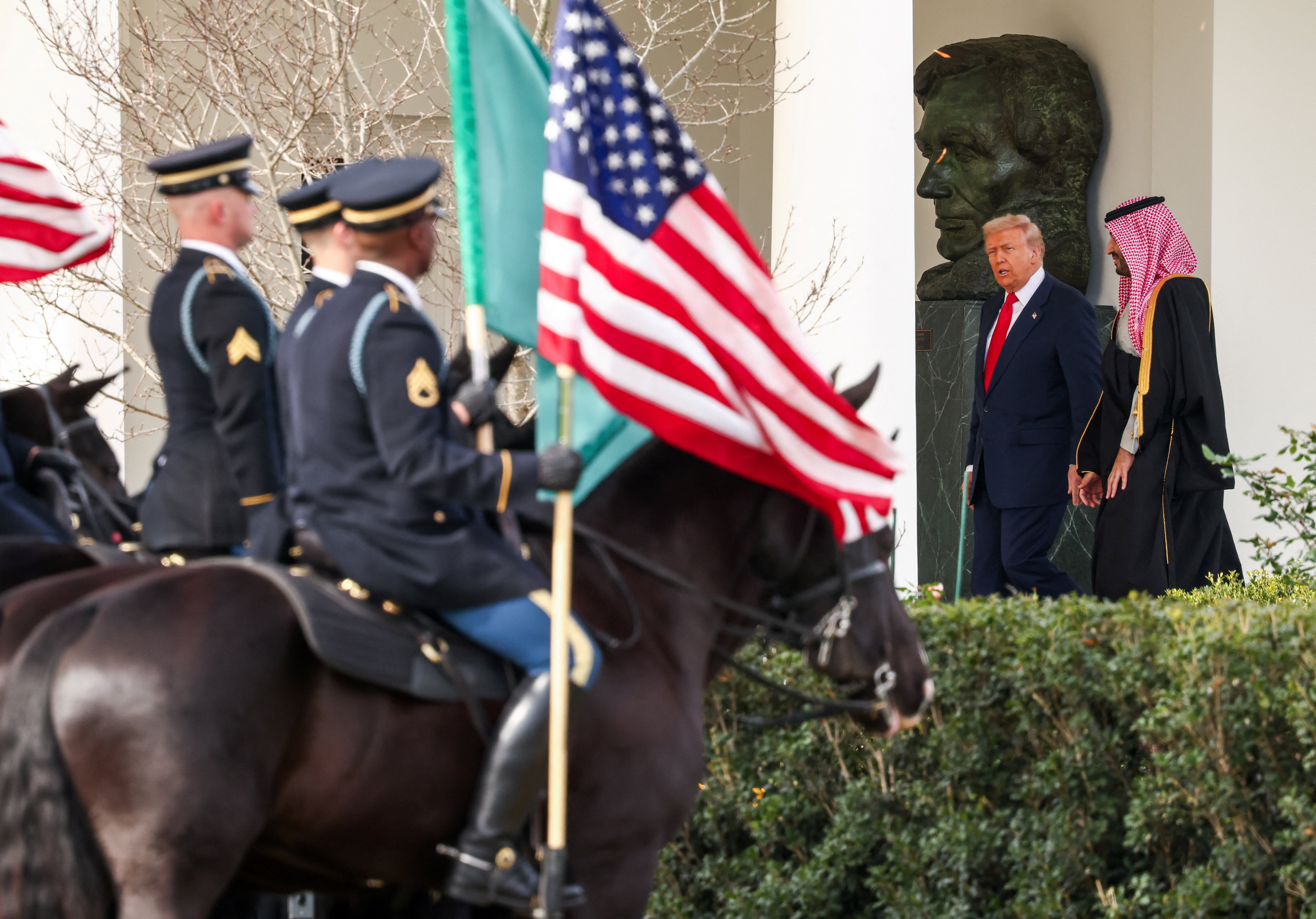 U.S. President Donald Trump walks with Saudi Crown Prince and Prime Minister Mohammed bin Salman at the White House in Washington, D.C., U.S., November 18, 2025. REUTERS/Kevin Lamarque