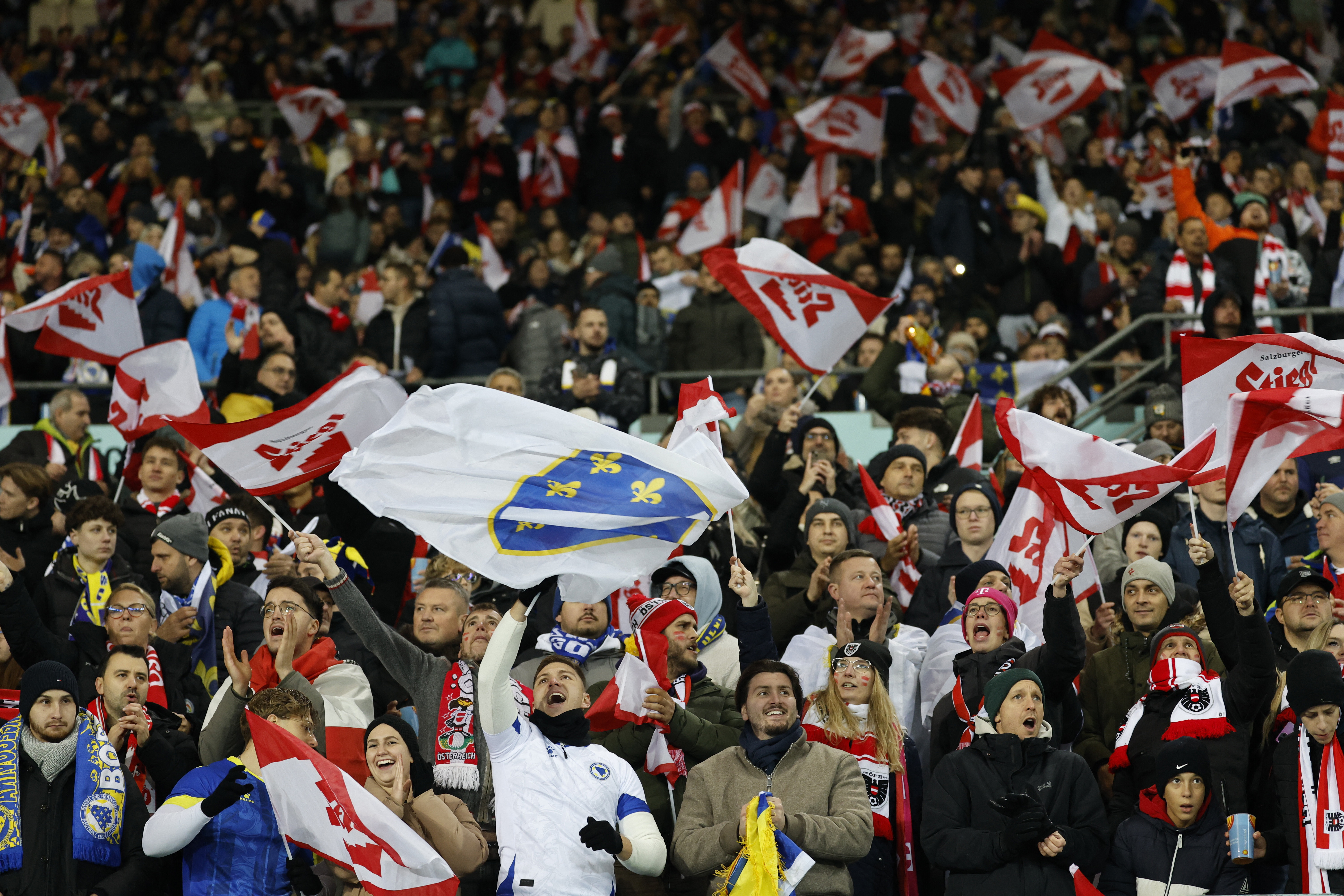 Soccer Football - FIFA World Cup - UEFA Qualifiers - Group H - Austria v Bosnia and Herzegovina - Ernst-Happel-Stadion, Vienna, Austria - November 18, 2025 Austria and Bosnia and Herzegovina fans react in the stands before the match REUTERS/Lisa Leutner