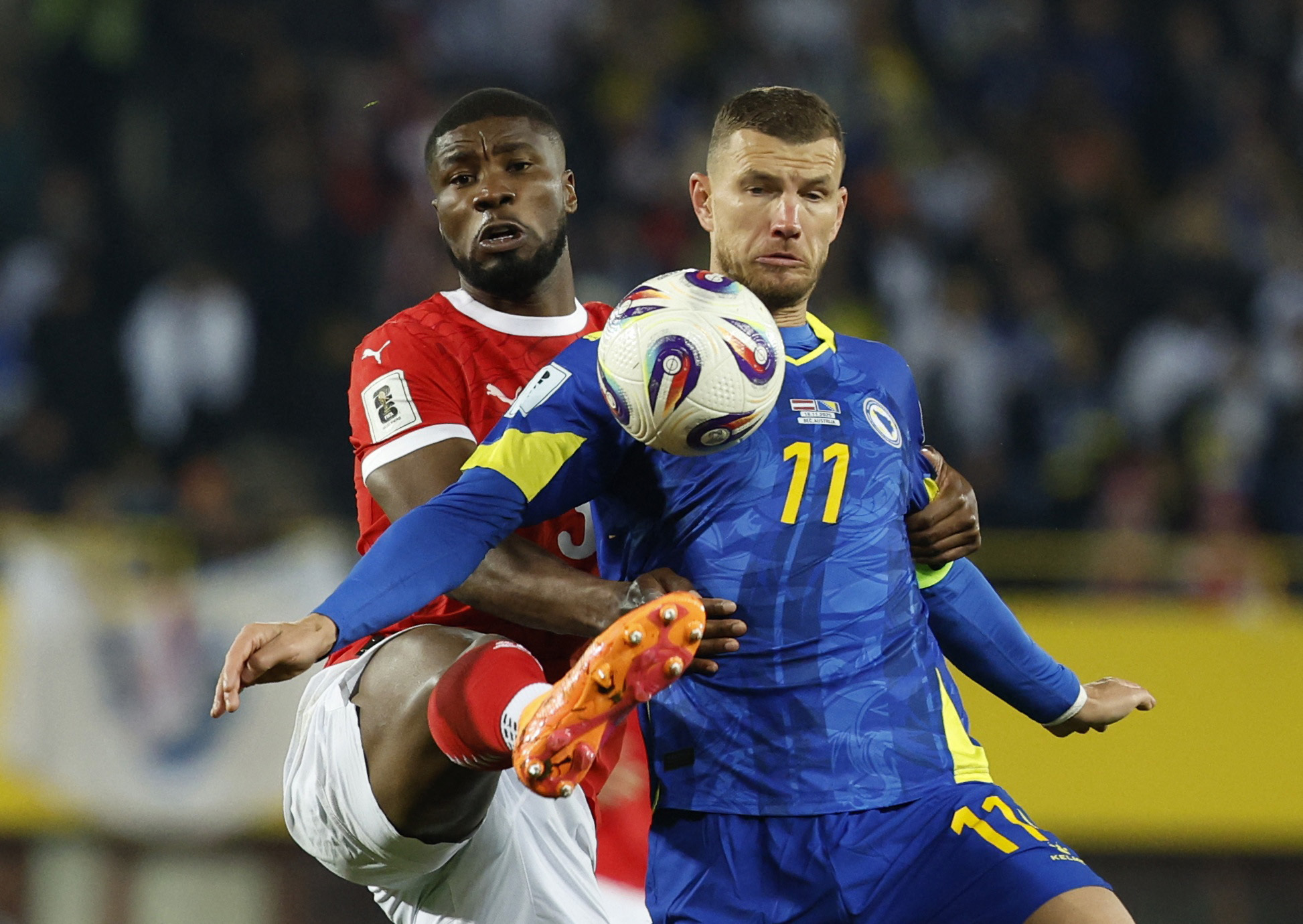 Soccer Football - FIFA World Cup - UEFA Qualifiers - Group H - Austria v Bosnia and Herzegovina - Ernst-Happel-Stadion, Vienna, Austria - November 18, 2025 Austria's David Alaba in action with Bosnia and Herzegovina's Edin Dzeko