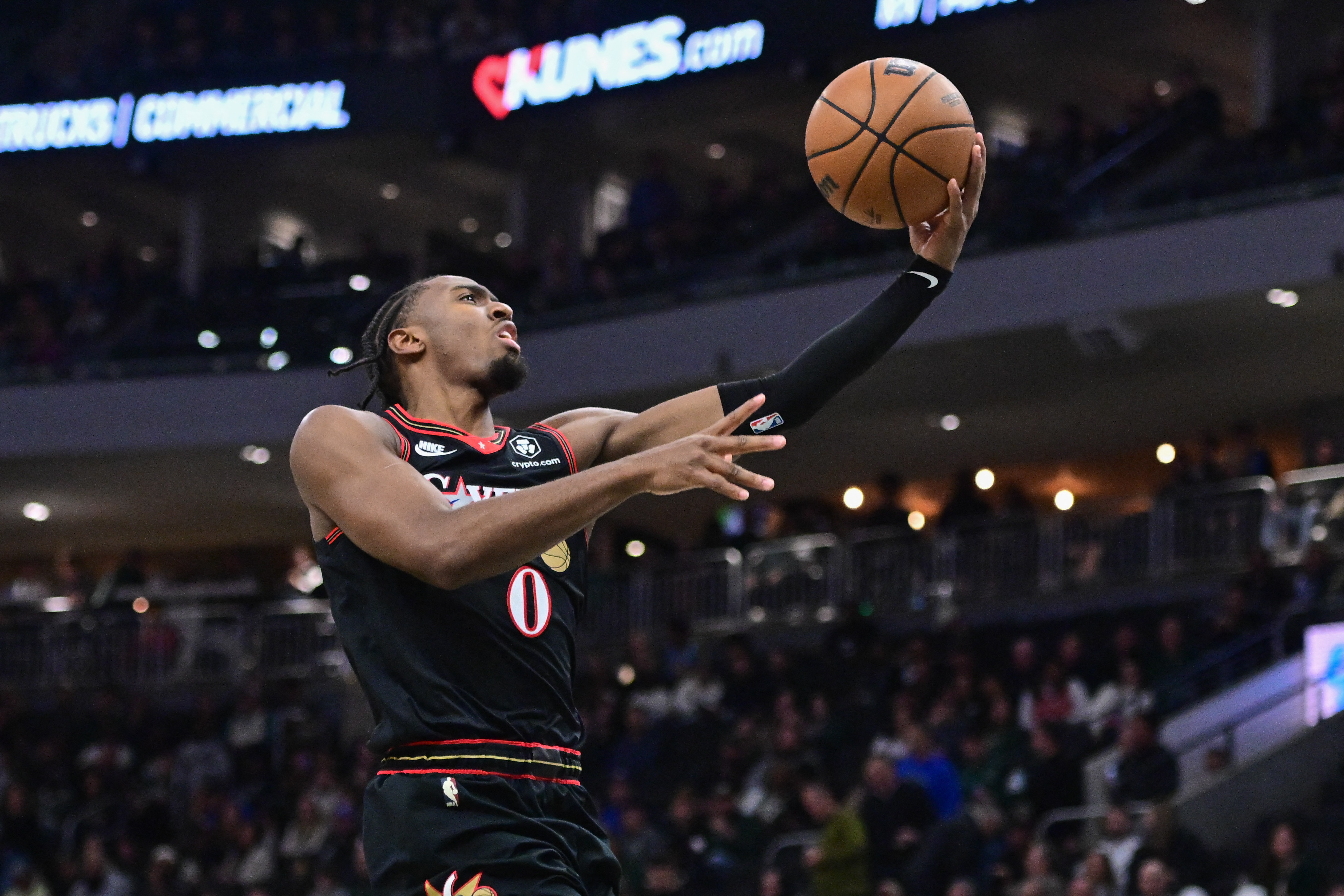 Nov 20, 2025; Milwaukee, Wisconsin, USA; Philadelphia 76ers guard Tyrese Maxey (0) takes a shot in the 3rd quarter against the Milwaukee Bucks at Fiserv Forum. Mandatory Credit: Benny Sieu-Imagn Images