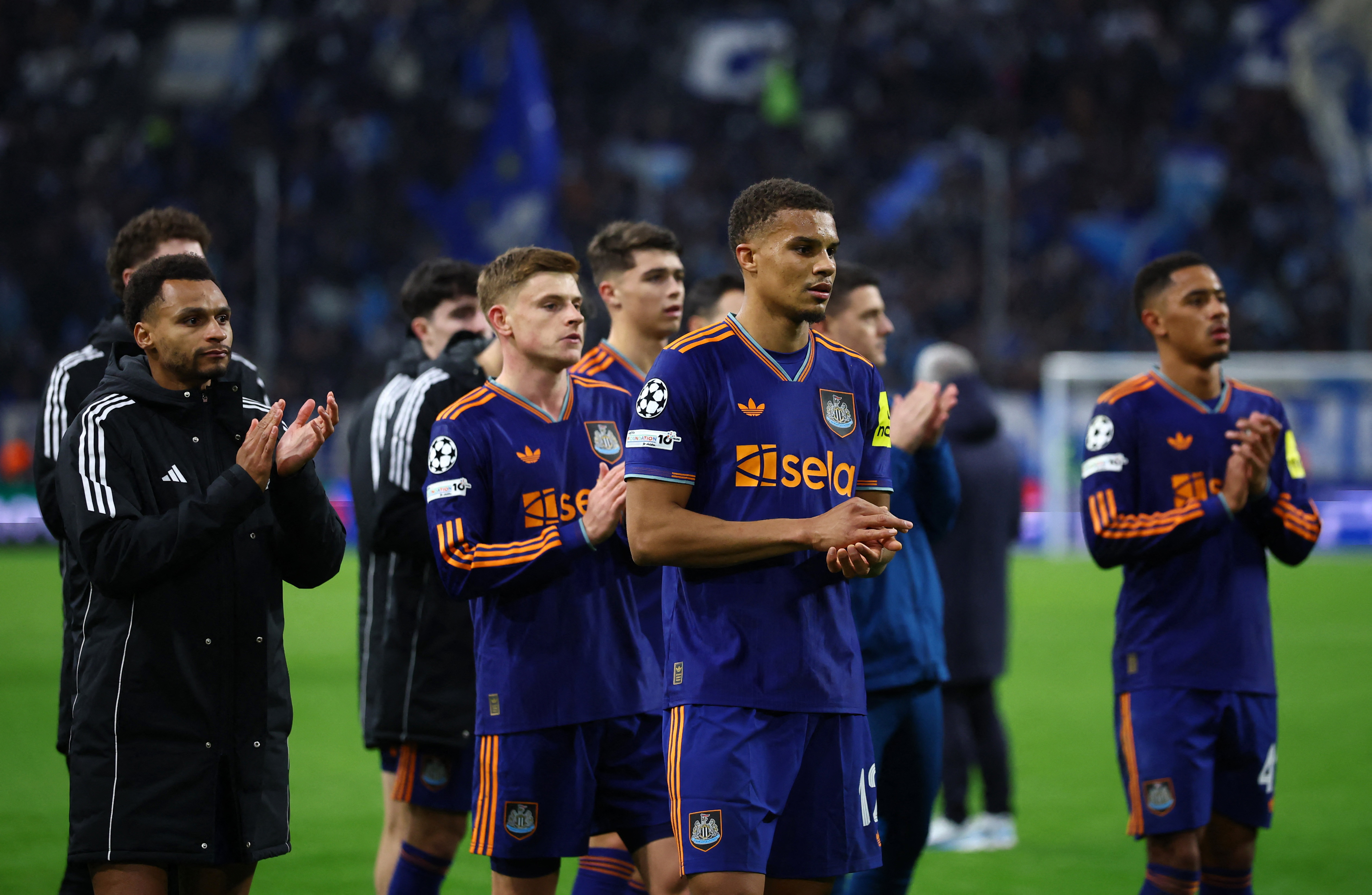 Soccer Football - UEFA Champions League - Olympique de Marseille v Newcastle United - Orange Velodrome, Marseille, France - November 25, 2025  Newcastle United's Malick Thiaw applauds fans after the match REUTERS/Manon Cruz
