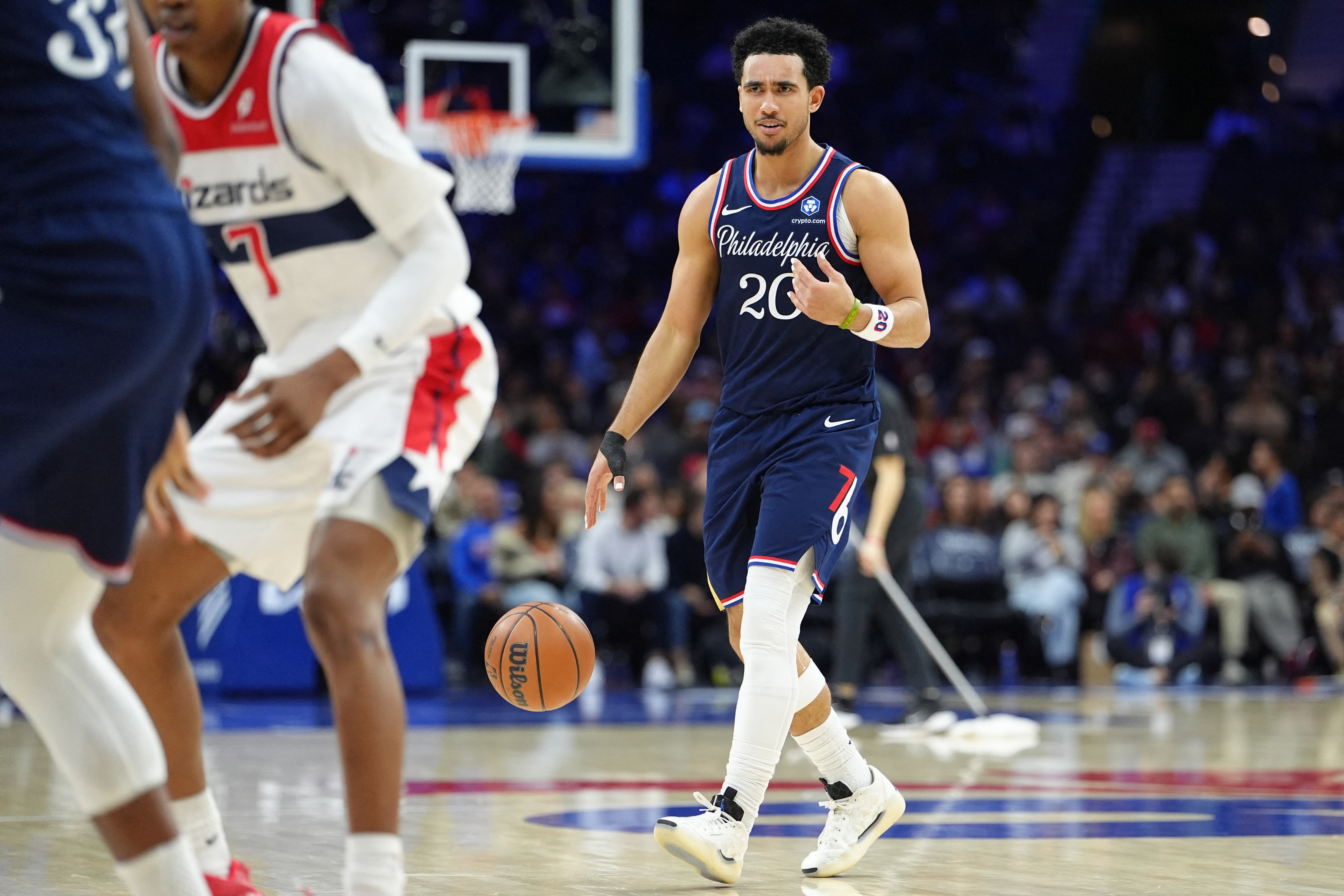 Dec 2, 2025; Philadelphia, Pennsylvania, USA; Philadelphia 76ers guard Jared McCain (20) controls the ball against the Washington Wizards in the fourth quarter at Xfinity Mobile Arena. Mandatory Credit: Kyle Ross-Imagn Images